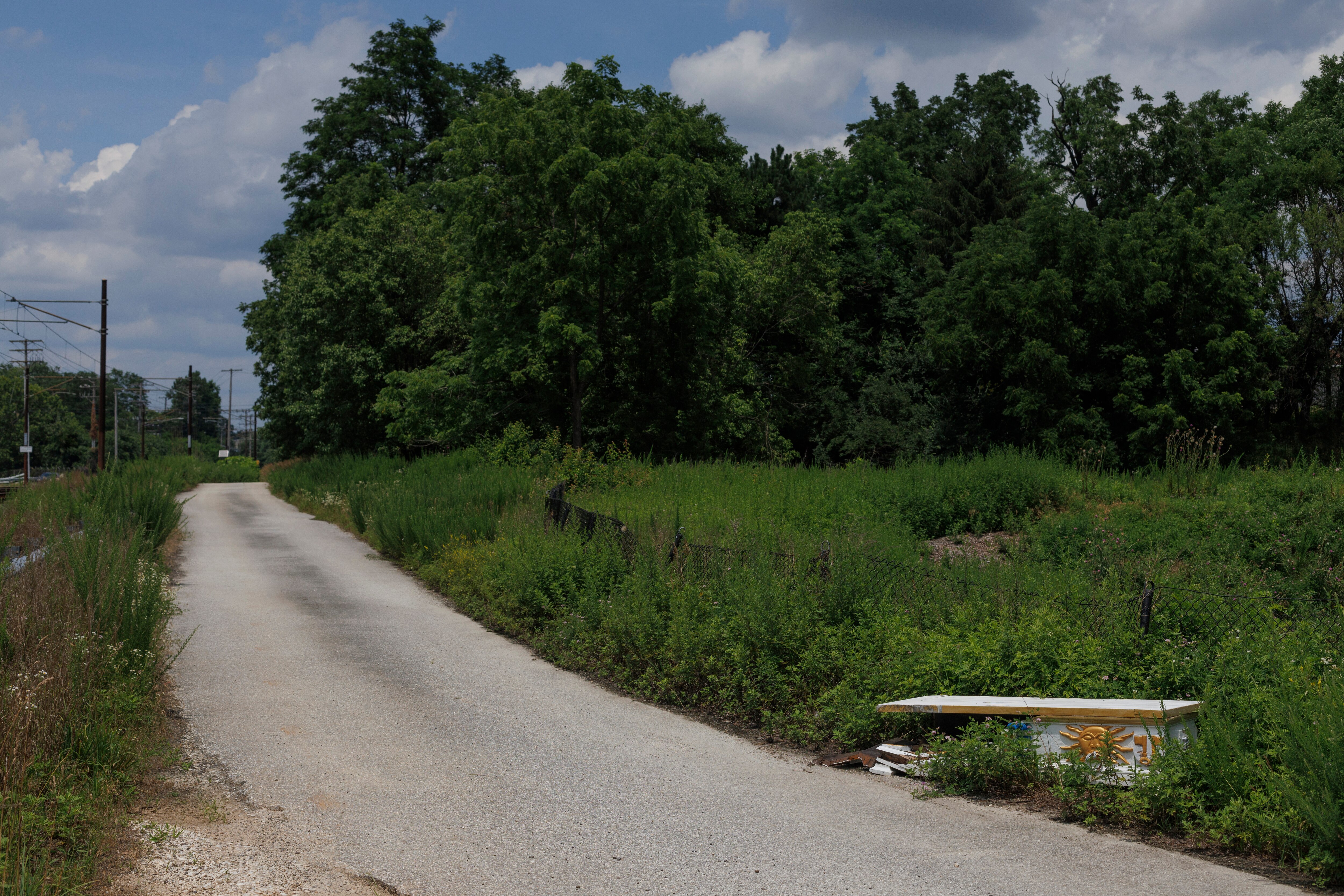 A mysterious coffin-like vessel is discarded along the roadside in Cockeysville, MD on July 1, 2025.