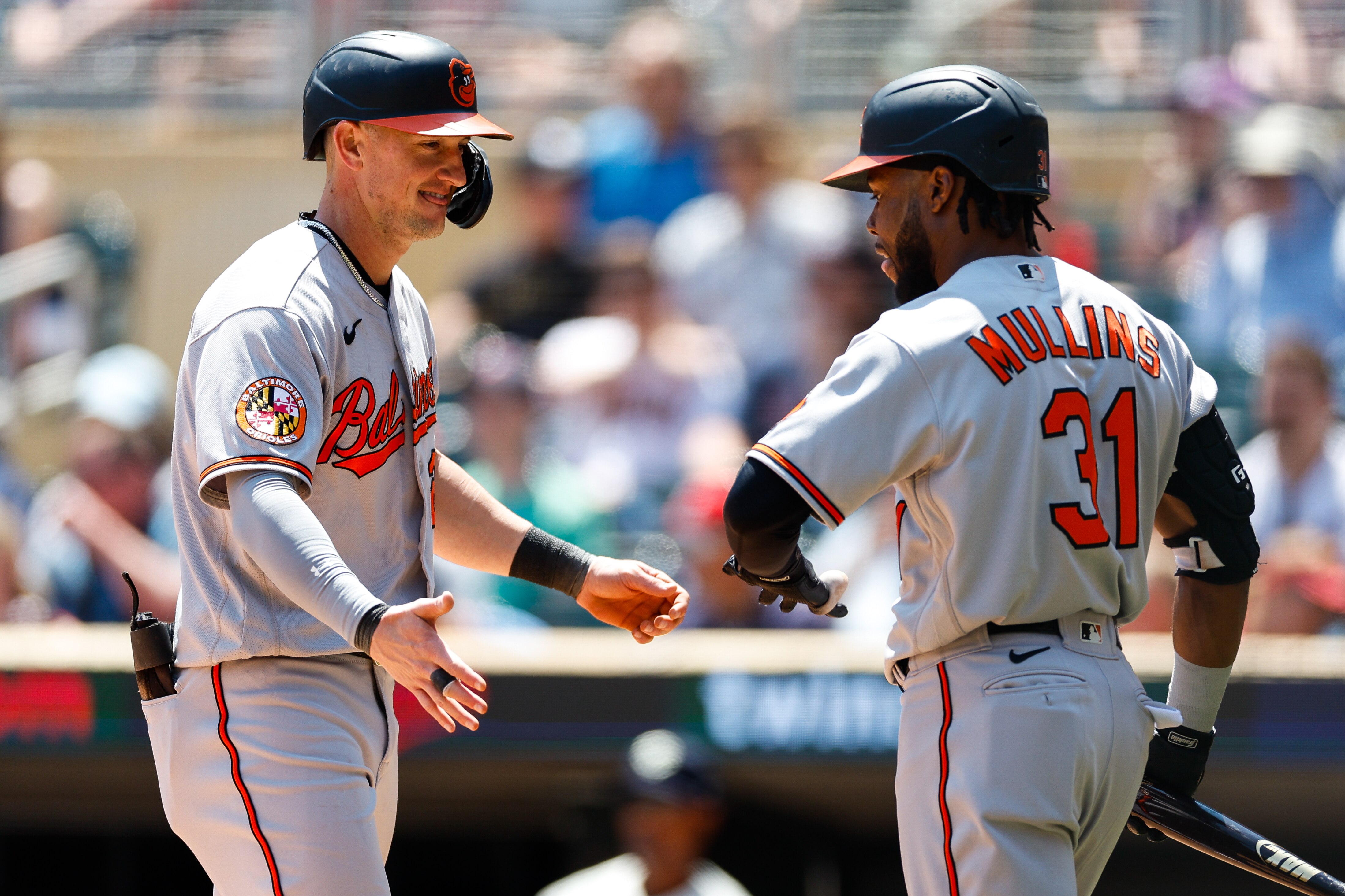 Orioles outfielders Austin Hays (left) and Cedric Mullins both have strong feelings for the Baltimore community.