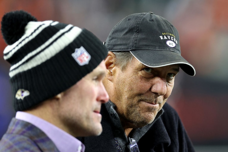 CINCINNATI, OHIO - JANUARY 15: Baltimore Ravens Owner Steve Bisciotti (R) talks with General Manager Eric DeCosta (L) prior to the AFC Wild Card playoff game against the Cincinnati Bengals at Paycor Stadium on January 15, 2023 in Cincinnati, Ohio.
