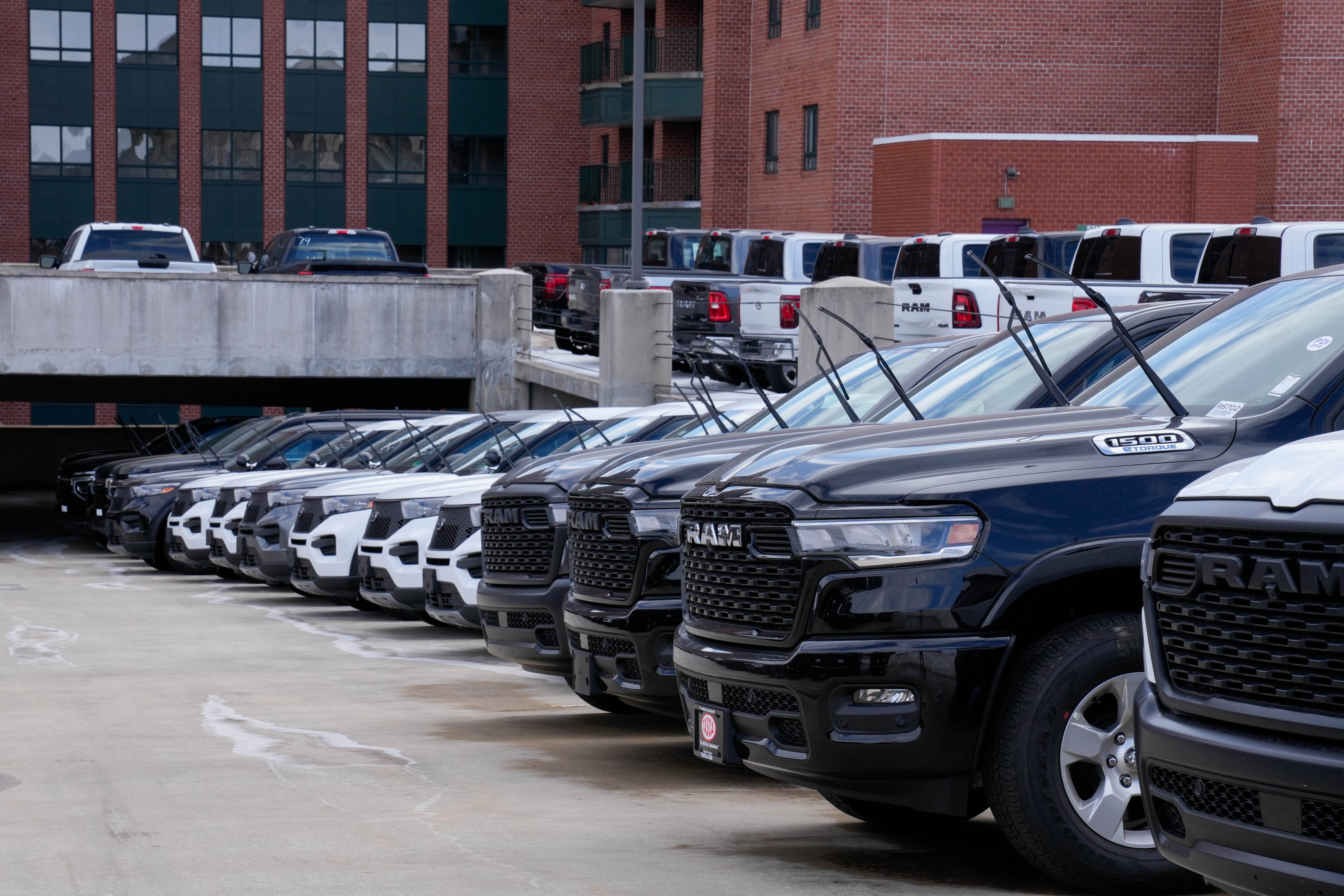 A fleet of law enforcement vehicles seen parked on the rooftop level of the Symphony Center Garage in Baltimore this month. All of the vehicles  were “removed” as of Wednesday, according to the leasing company of the garage.