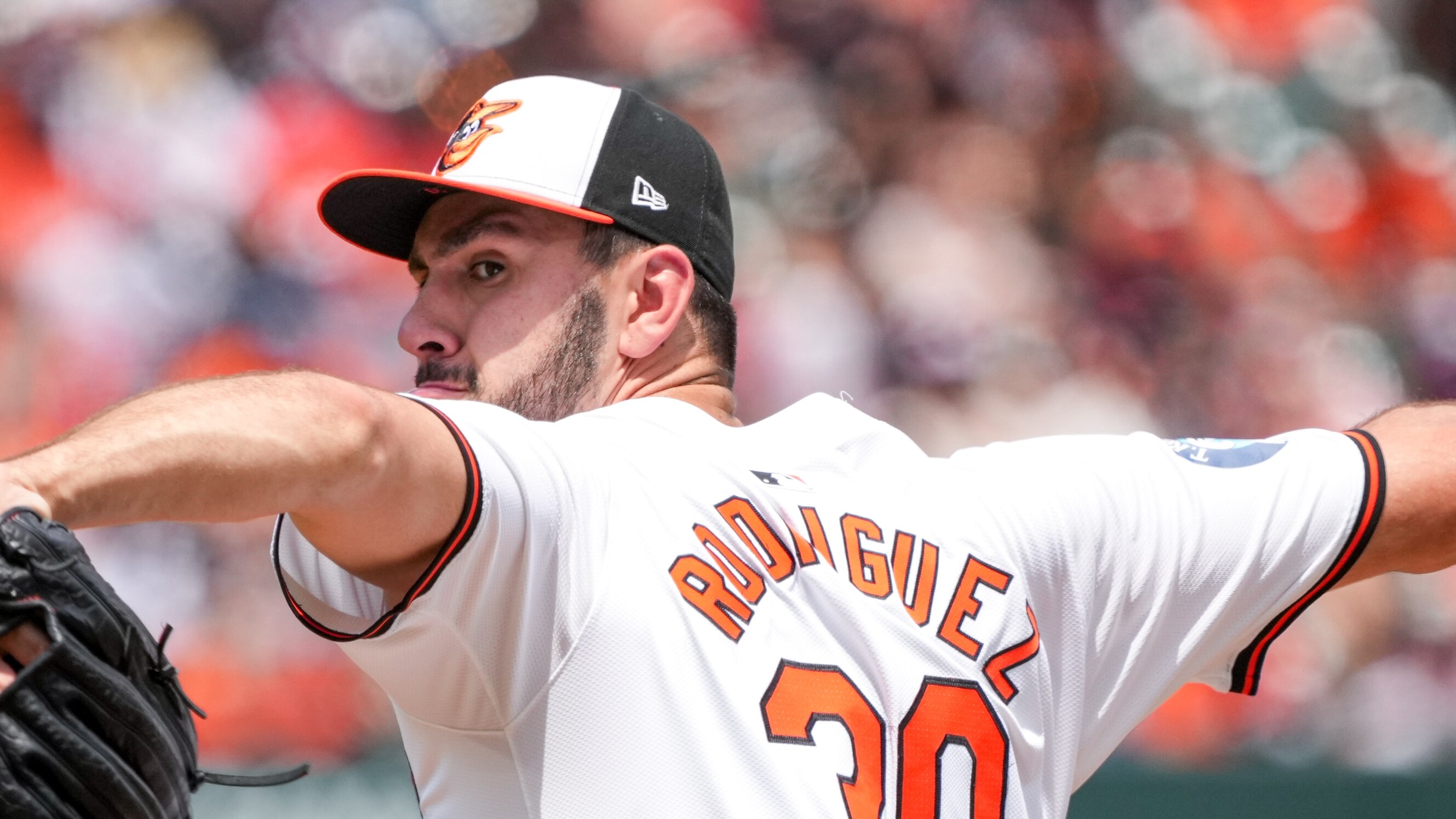 Baltimore Orioles pitcher Grayson Rodriguez (30) delivers a pitch during a game against the Toronto Blue Jays at Camden Yards on July 31, 2024.