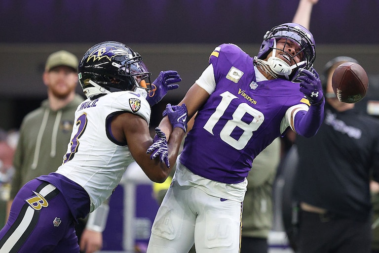 Ravens cornerback Chidobe Awuzie breaks up a pass intended for Minnesota Vikings wide receiver Justin Jefferson during the fourth quarter.
