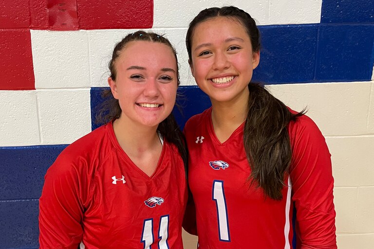Brianna Bossom (11) and Mailinh Godschall (1) led No. 3 Centennial to a season-opening volleyball victory over No. 9 Howard Tuesday night. Godschall pounded out 12 kills while Bossom had 39 assists.