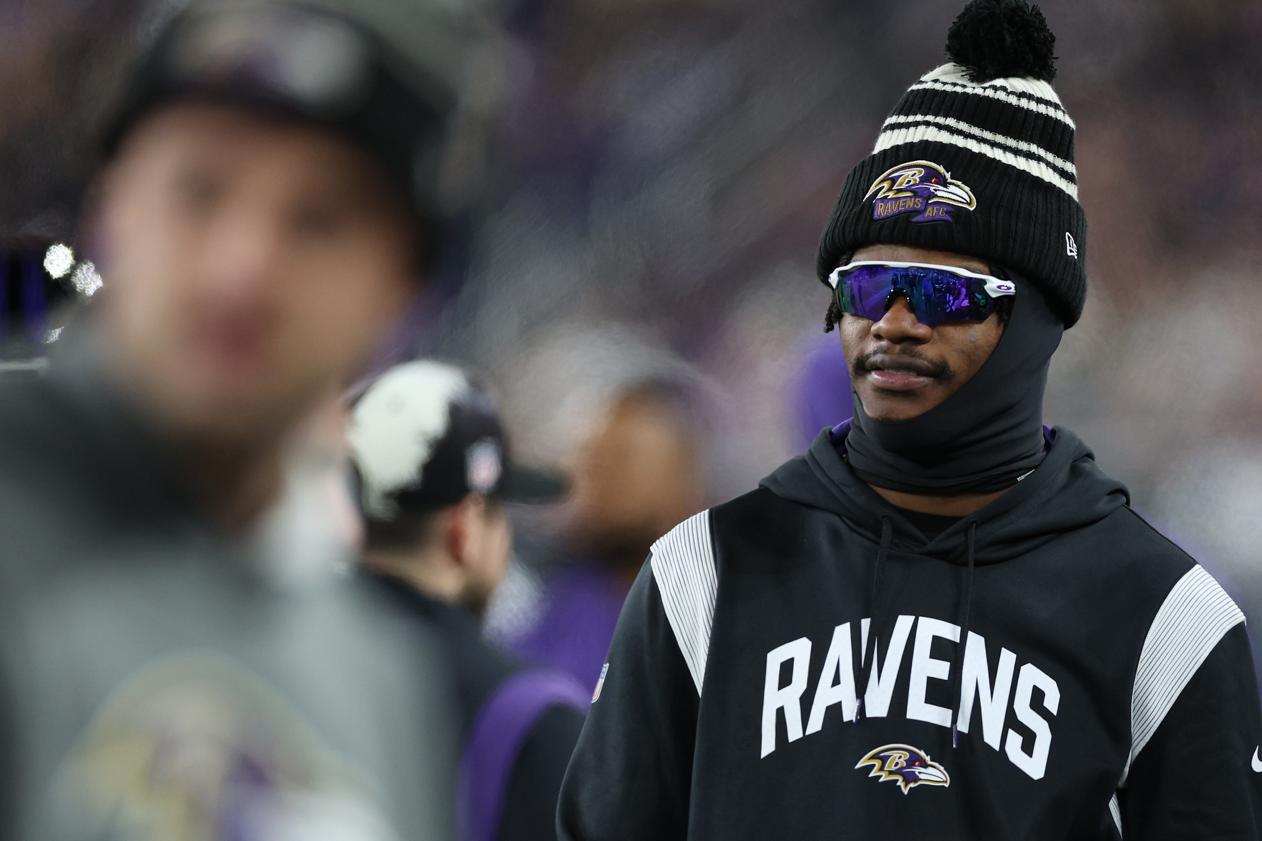 BALTIMORE, MARYLAND - JANUARY 01: Quarterback Lamar Jackson #8 of the Baltimore Ravens looks on from the sideline as the Baltimore Ravens play against the Pittsburgh Steelers at M&T Bank Stadium on January 1, 2023 in Baltimore, Maryland. (Photo by Patrick Smith/Getty Images)