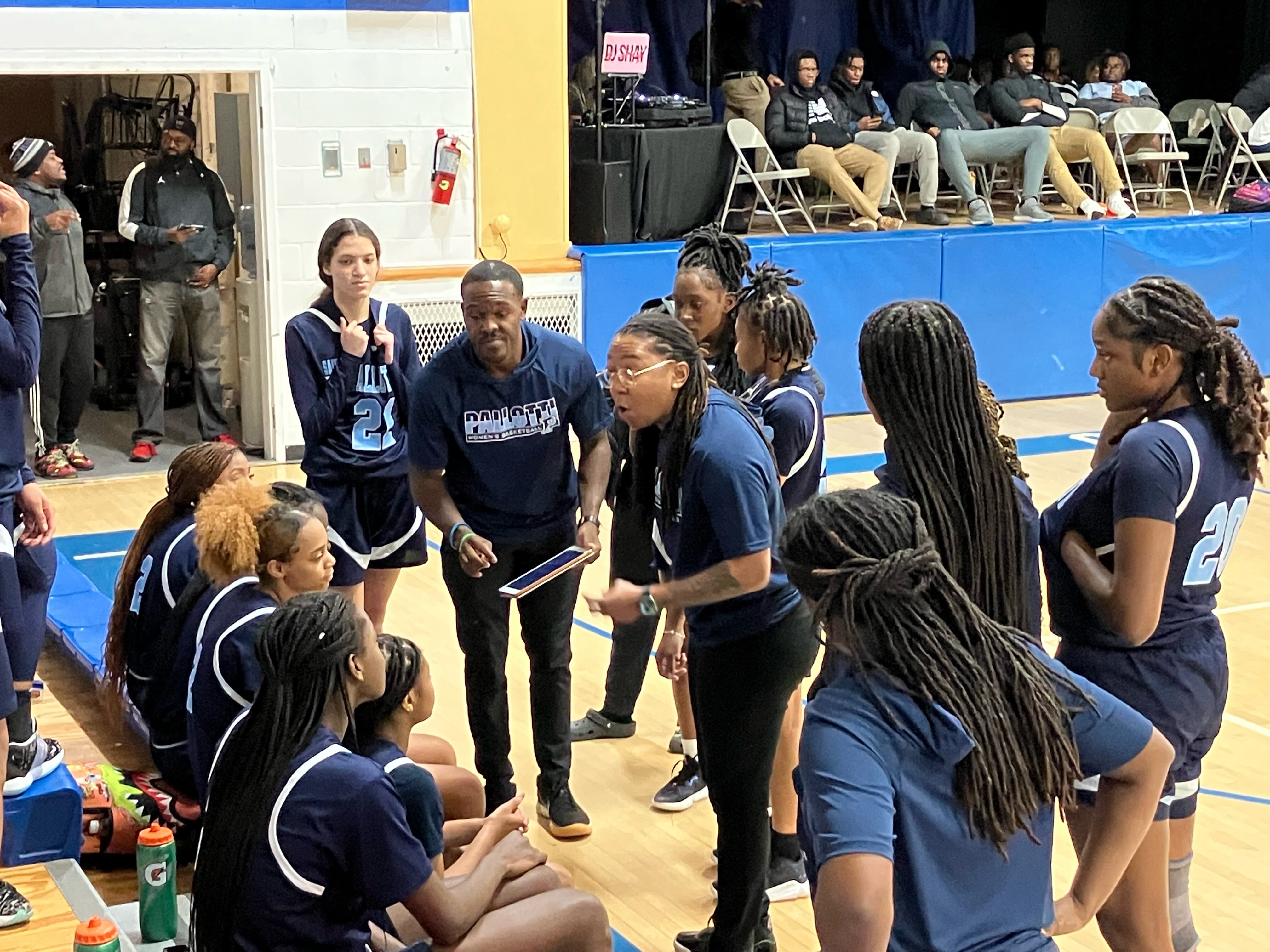 St. Vincent Pallotti Coach Rashida Joiner exhorts the fourth-ranked Panthers to continue their winning ways in a 67-42 triumph over No. 13 Mount Carmel on Friday night in Essex.