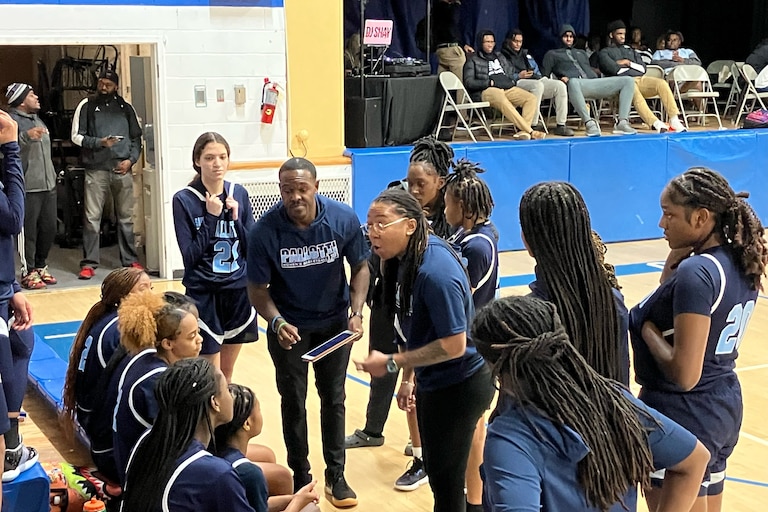 St. Vincent Pallotti Coach Rashida Joiner exhorts the fourth-ranked Panthers to continue their winning ways in a 67-42 triumph over No. 13 Mount Carmel on Friday night in Essex.
