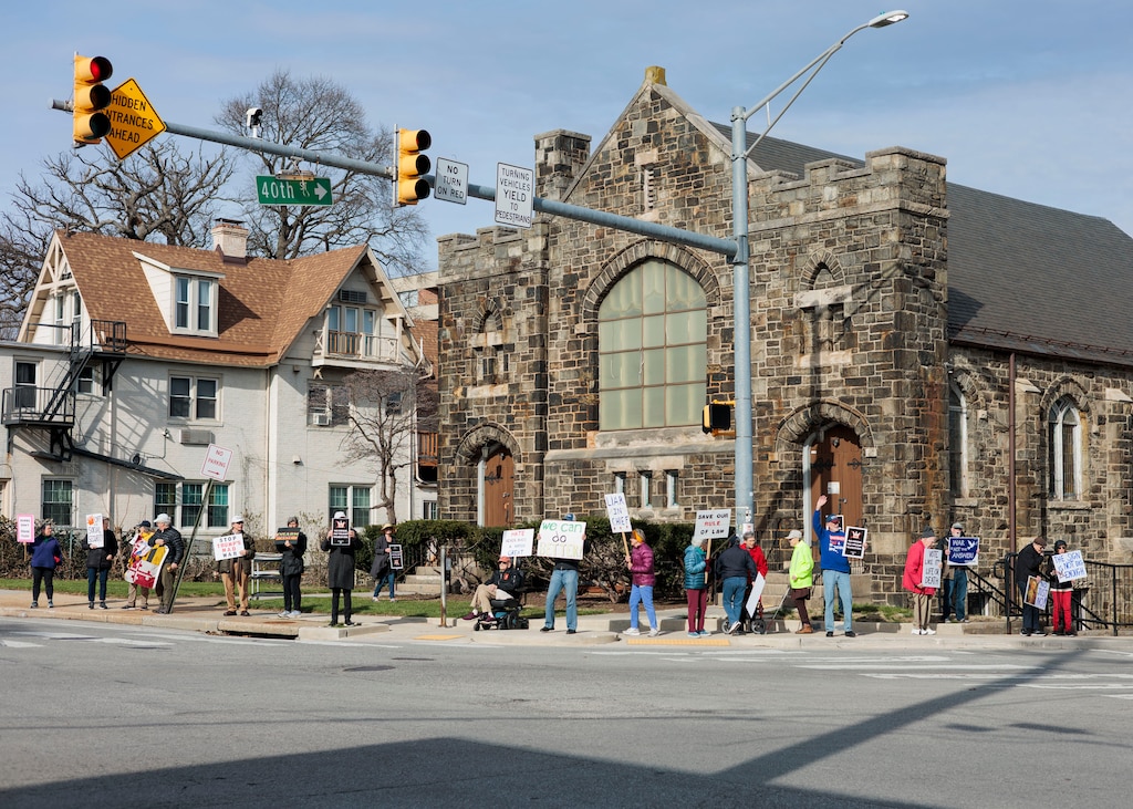 Senior activists meet up every Wednesday on the corner of 40th Street and Roland Avenue in Hampden to protest actions of the Trump administration.