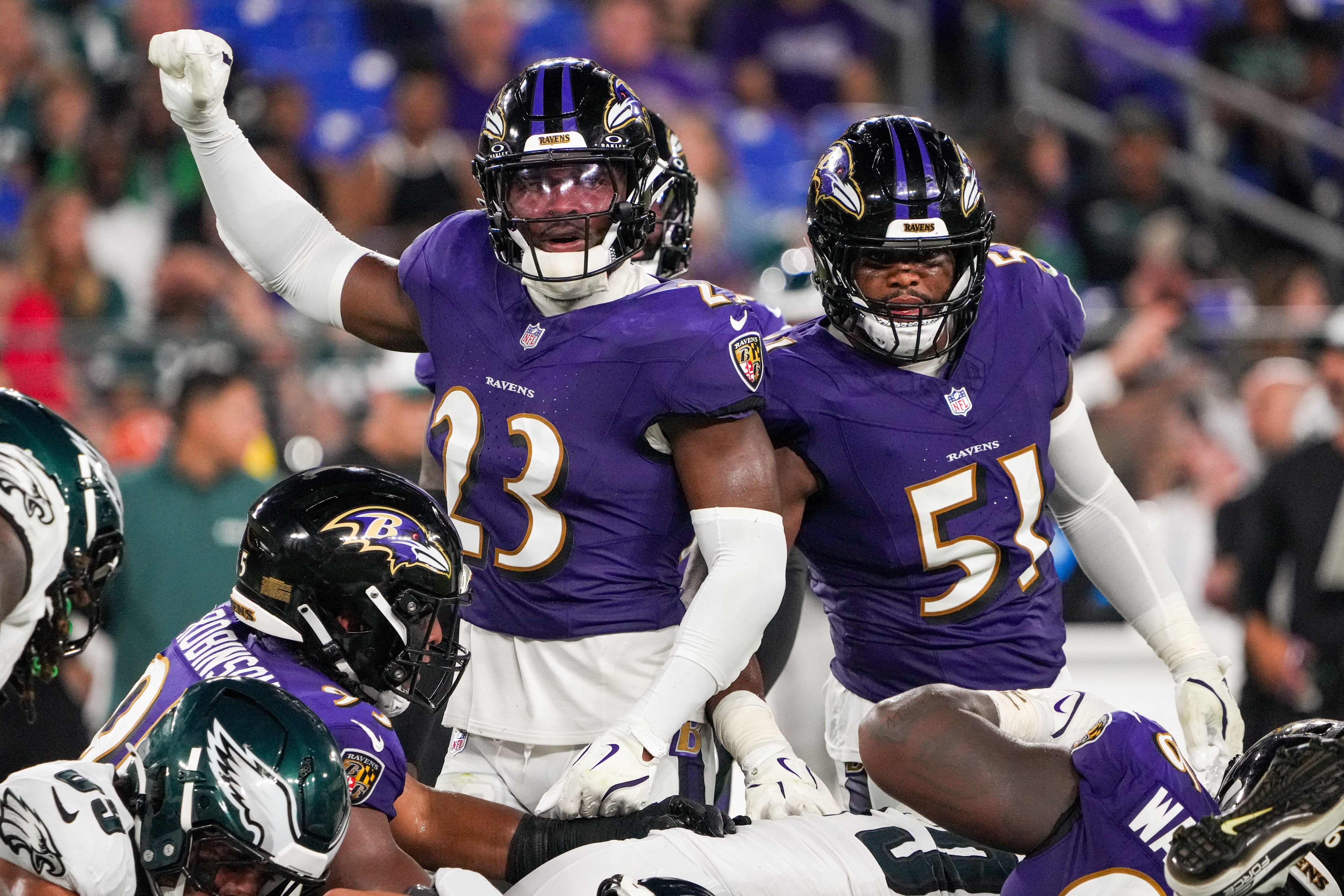 Baltimore Ravens linebacker Trenton Simpson (23) raises his fist as the team makes a stop in the second quarter of the team’s preseason game against the Philadelphia Eagles at M&T Bank Stadium in Baltimore on Friday, August 09, 2024.