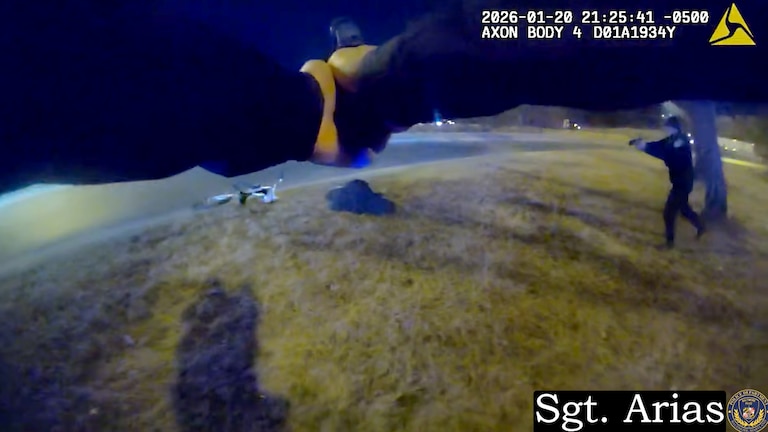 A still from a body camera worn by Baltimore Police Sgt. Carlos Arias shows two Baltimore Police Department officers and a 40-year-old man they shot and killed near 6500 Eastern Avenue on January 20, 2026.