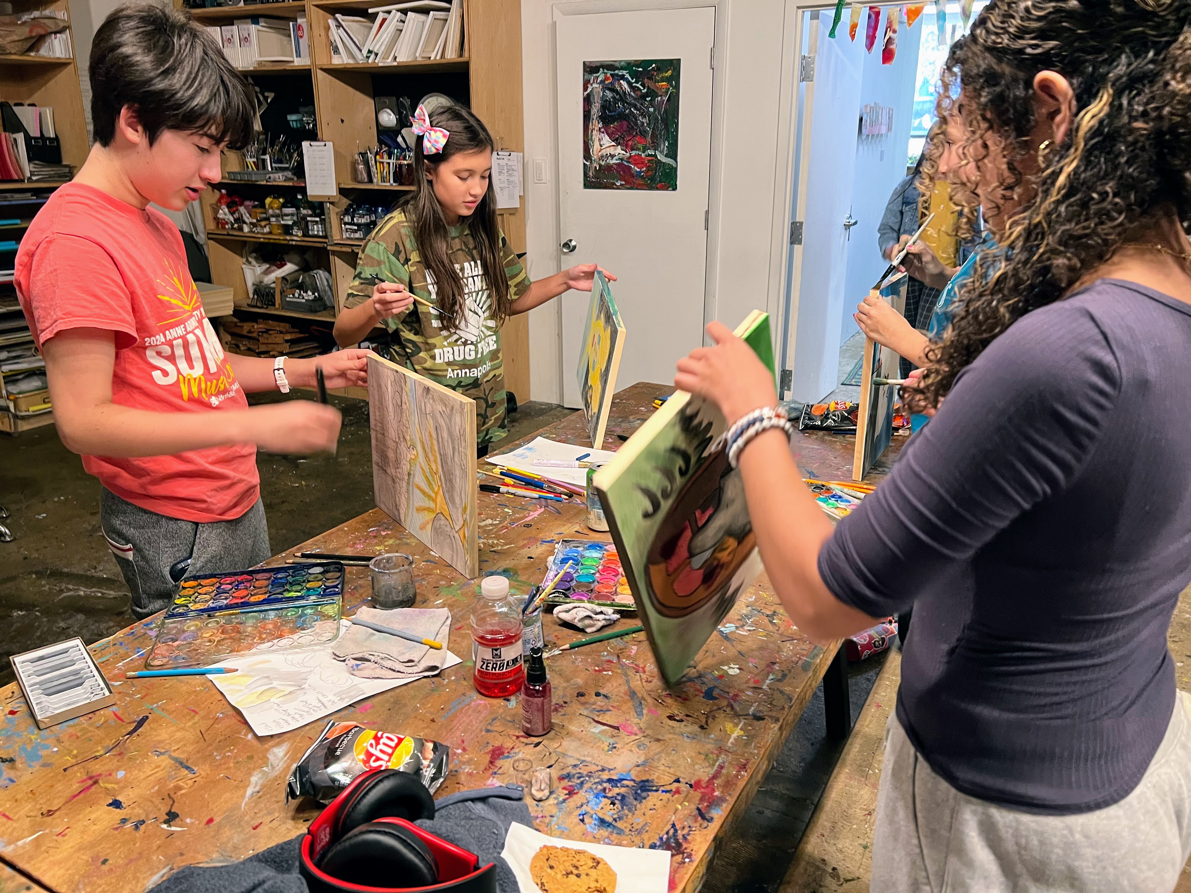 ArtFarm students work on mixed-media pieces for the Jan. 28-Feb. 3 performances of "Pictures at an Exhibition" by the Annapolis Symphony Orchestra.