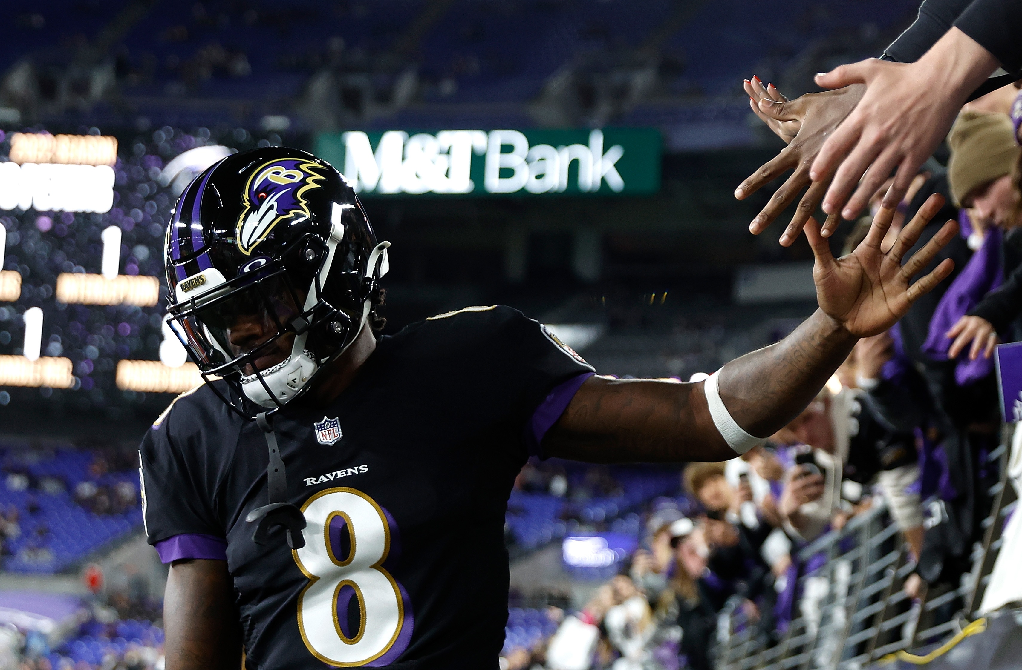 Lamar Jackson #8 of the Baltimore Ravens acknowledges fans during pregame warmups prior to facing the Cincinnati Bengals at M&T Bank Stadium on October 09, 2022 in Baltimore, Maryland.