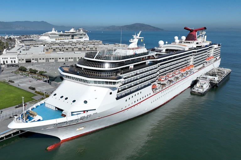 In an aerial view, the Carnival Miracle cruise ship operated by Carnival Cruise Lines sits docked at Pier 27 on September 30, 2022 in San Francisco, California.