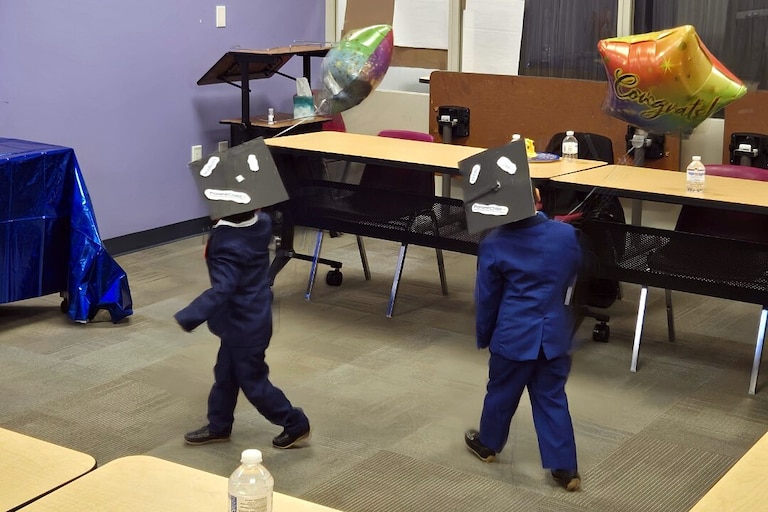 East Baltimore cousins celebrate their graduation from the ParentChild+ program. Coordinator Norma Fuentes-Montesino said they did longer sessions to make sure they could graduate by their fourth birthday.