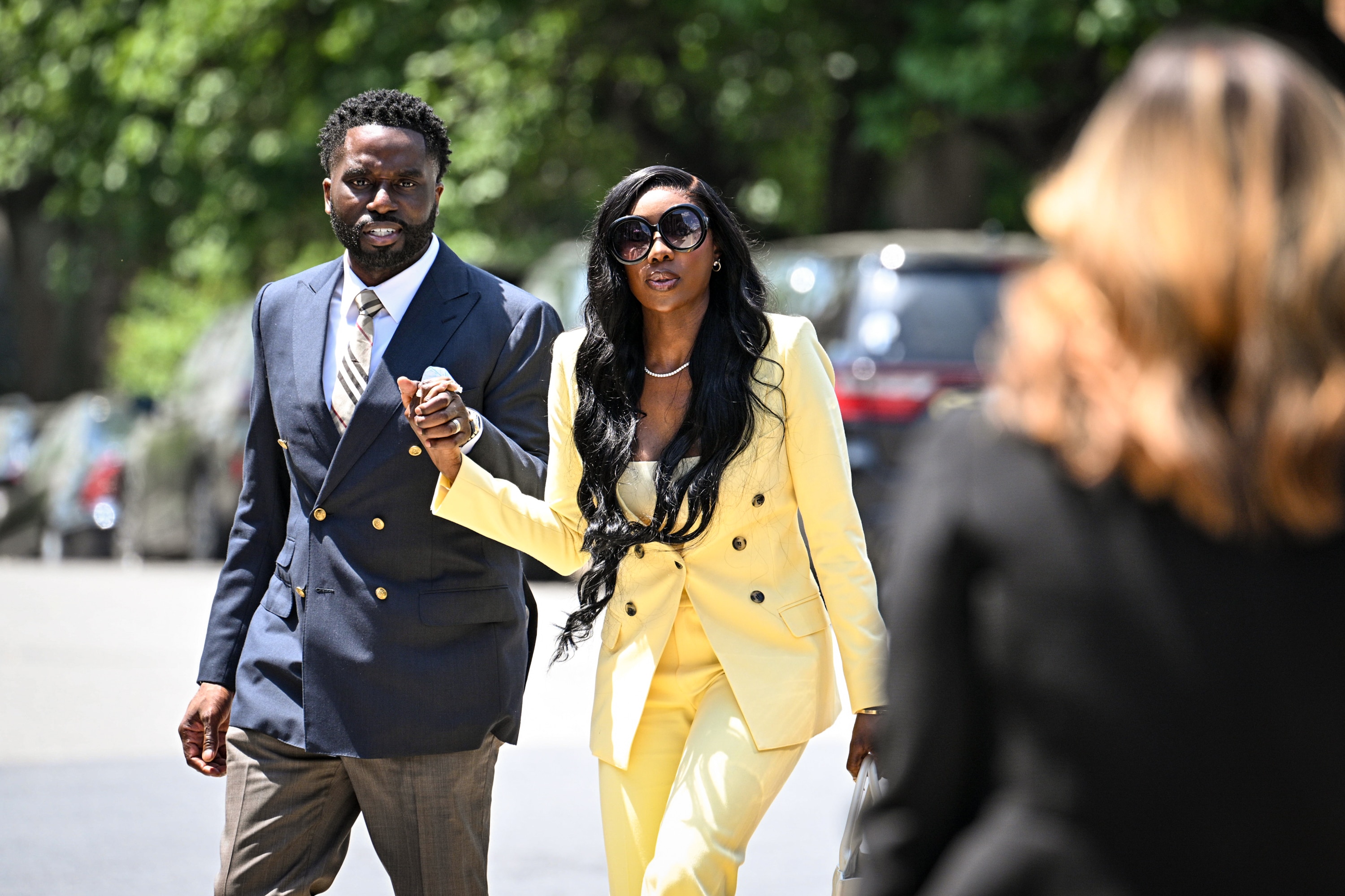 “Real Housewives of Potomac” stars Eddie and Wendy Osefo arrive at the Carroll County Circuit Court on Wednesday for a hearing on their indictment.