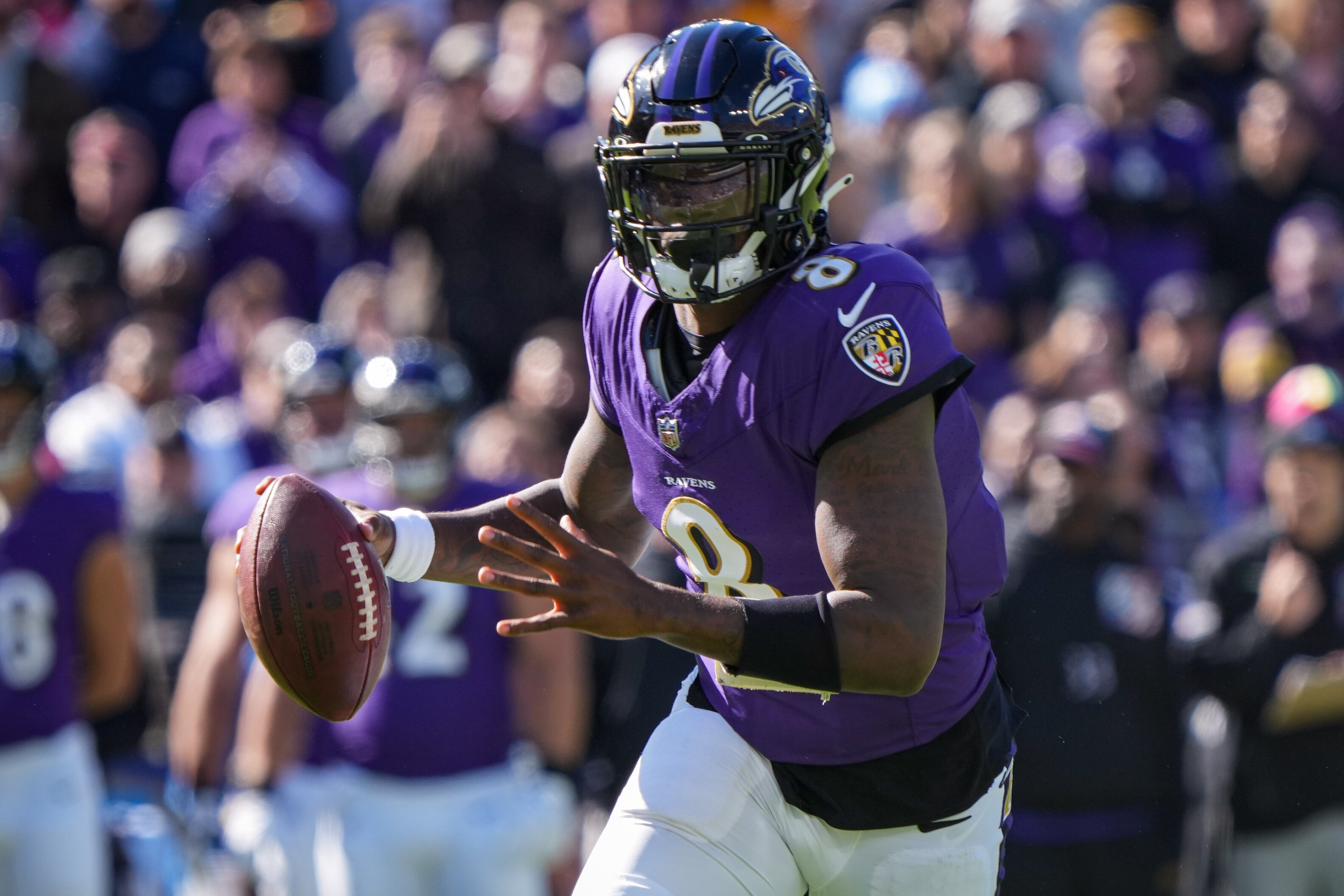 Baltimore Ravens quarterback Lamar Jackson rushes with the ball in the red zone during a football game against the Detroit Lions at M&T Bank Stadium on Sunday, October 22.
