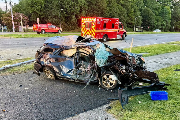A car that included seven children collided near Great Seneca Highway and Clopper Road in Germantown Tuesday with another vehicle whose driver died in the crash, Montgomery County Police said Tuesday.