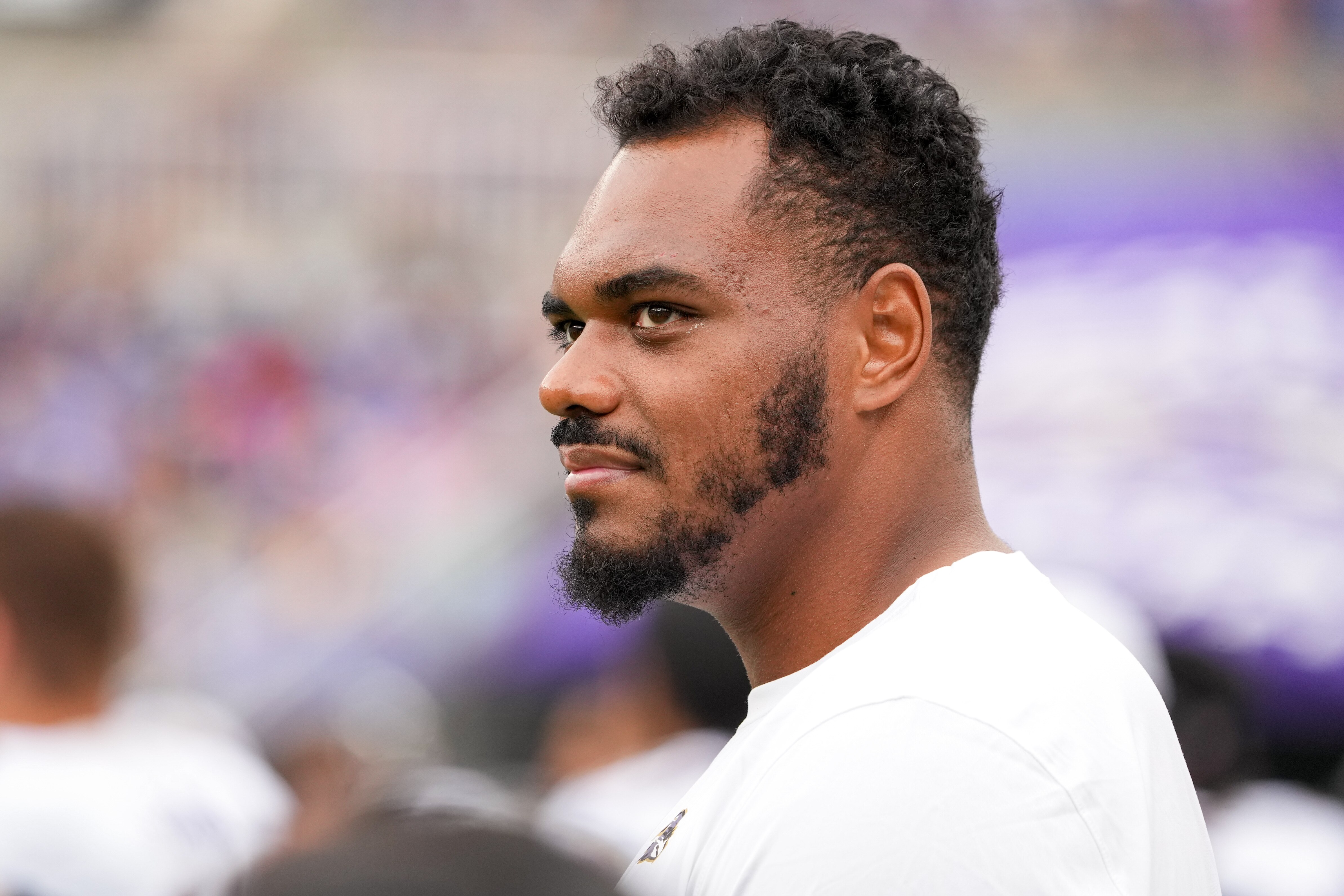 Offensive tackle Ronnie Stanley (79) watches from the sidelines during a preseason game against the Atlanta Falcons last August.