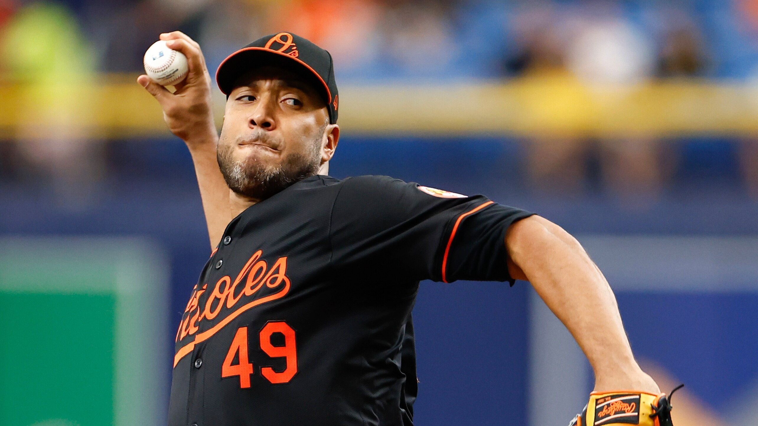 ST PETERSBURG, FLORIDA - AUGUST 11: Albert Suárez #49 of the Baltimore Orioles throws a pitch during the first inning against the Tampa Bay Rays at Tropicana Field on August 11, 2024 in St Petersburg, Florida. (Photo by Douglas P. DeFelice/Getty Images)