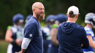 Seattle Seahawks offensive coordinator Brian Fleury on the field during training camp.