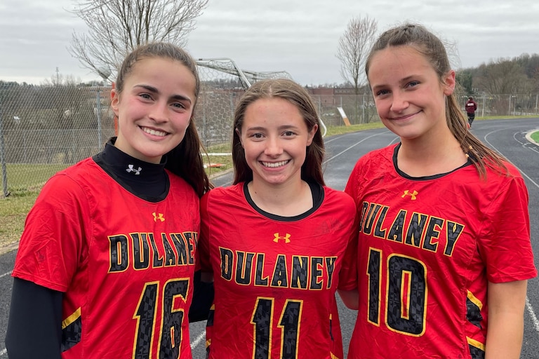 Max Yeakel (16), Audrey Simoes (11) and Anna Jones (10) celebrated Dulaney's first girls lacrosse victory over Hereford since 2018. Yeakel and goalie Simoes, with 12 saves, paced a stingy defense while Jones had three goals and three assists in the 9-5 win over the four-time defending Baltimore County champions Friday afternoon.