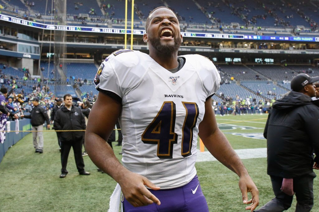 Anthony Levine Sr. celebrates as he leaves the field after the Ravens beat the Seattle Seahawks in 2019.