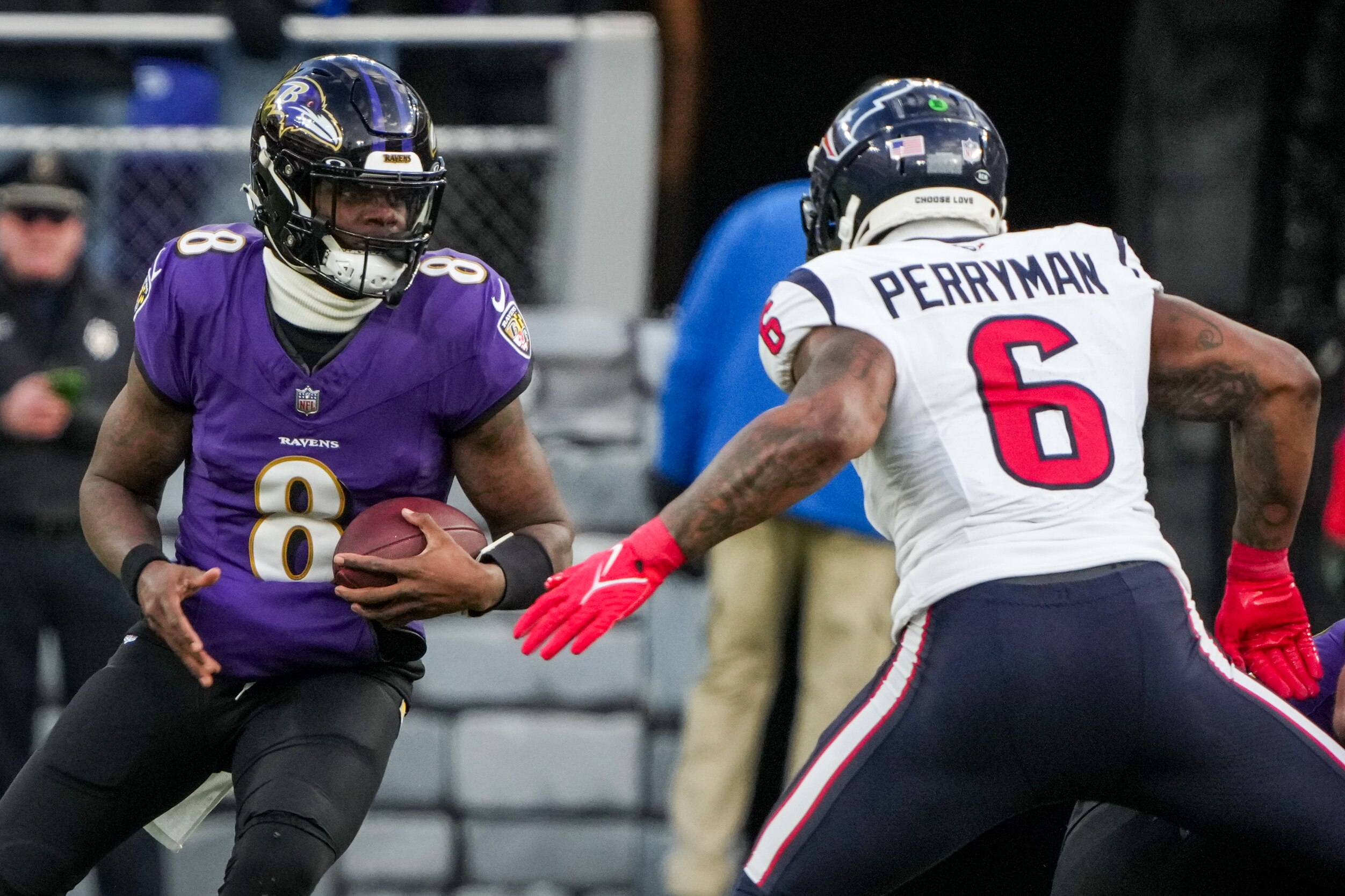 Ravens quarterback Lamar Jackson jukes Houston Texans linebacker Denzel Perryman while scrambling at M&T Bank Stadium during a playoff game in January. The teams will meet for the third time in two seasons on Christmas.