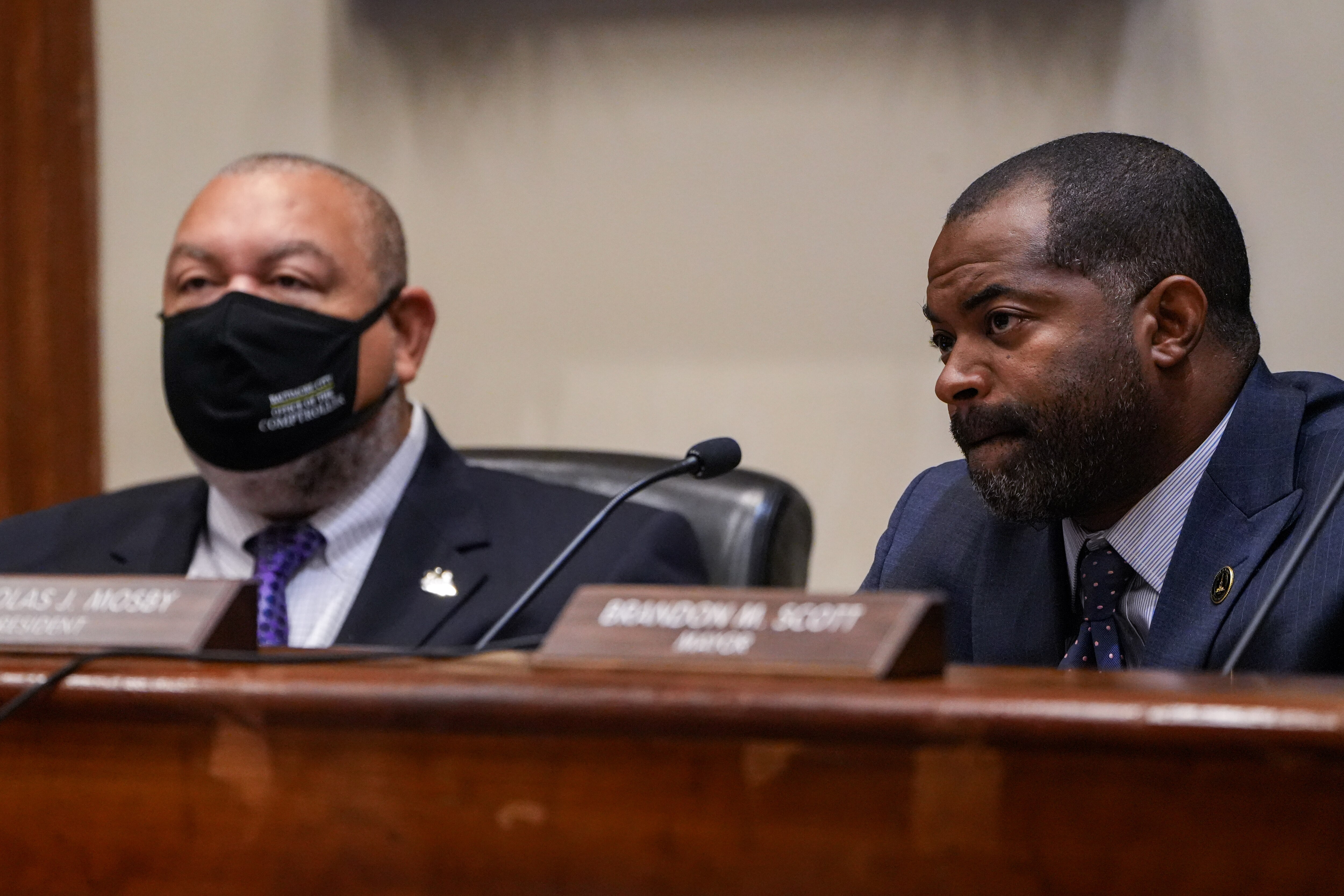 Comptroller Bill Henry, left, and Council President Nick Mosby listen during a Baltimore City Board of Estimates meeting inside City Hall on 10/5/22.