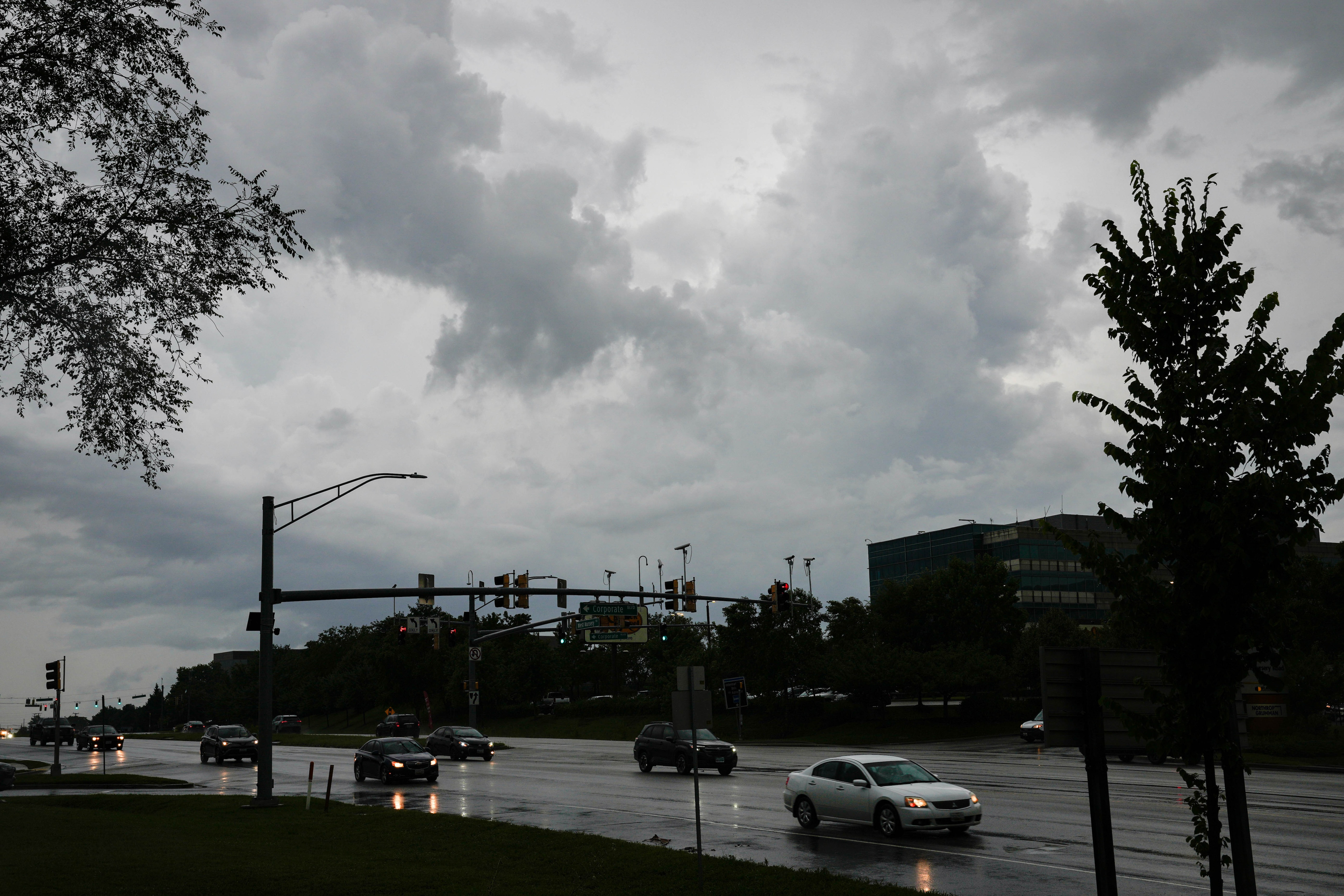 Cars drive on West Nursery Road near BWI during a thunderstorm in the Baltimore, Md. region on Tuesday, July 1, 2025.