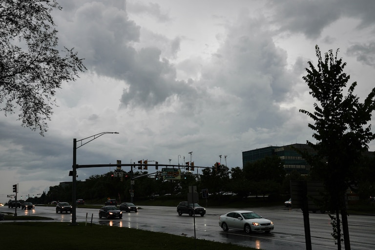 Cars drive on West Nursery Road near BWI during a thunderstorm in the Baltimore, Md. region on Tuesday, July 1, 2025.