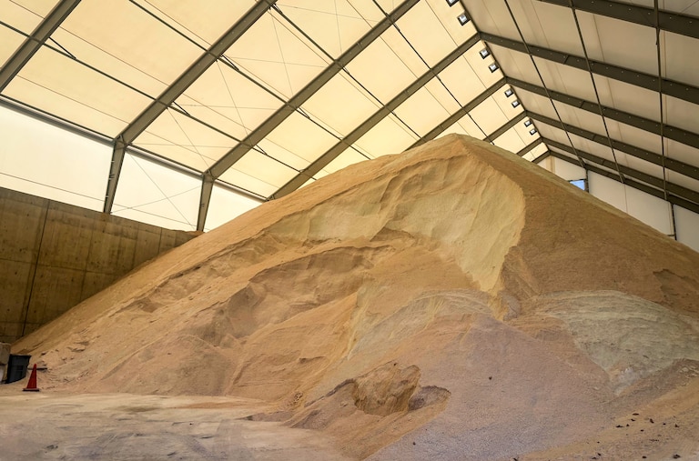A massive pile of salt that is stored at the county's Department of Transportation highway service salt barn in Rockville. The county stores about 50,000 tons of salt at the facility.