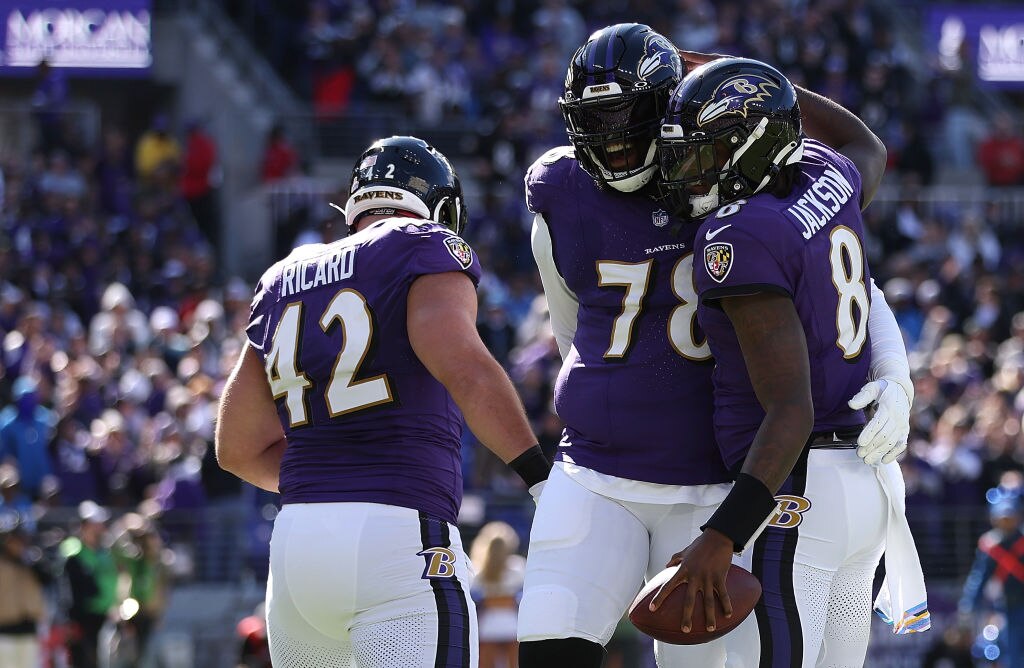 Lamar Jackson, Morgan Moses and Patrick Ricard celebrate a Jackson touchdown this season. These Ravens have better wins, a more complete quarterback and more ways to win than the 2019 team that lost its first playoff game.