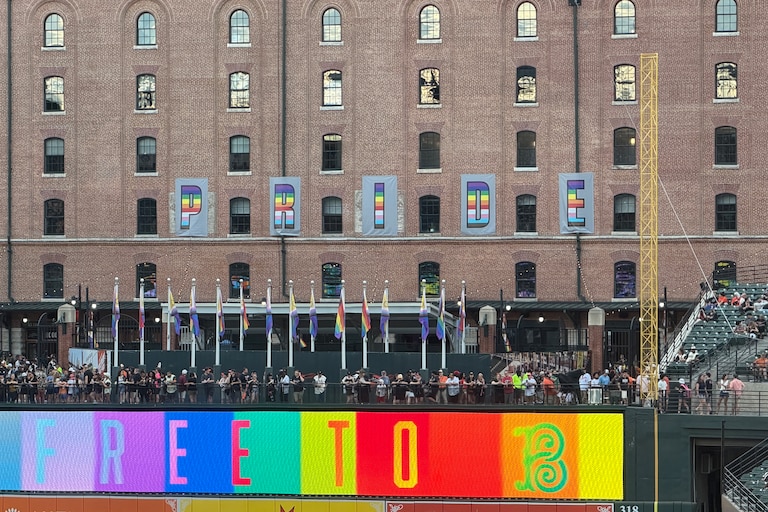 The Orioles decorated for Pride Night by adding rainbow letters to the warehouse and Pride flags to the flagpoles on the right field flag court.