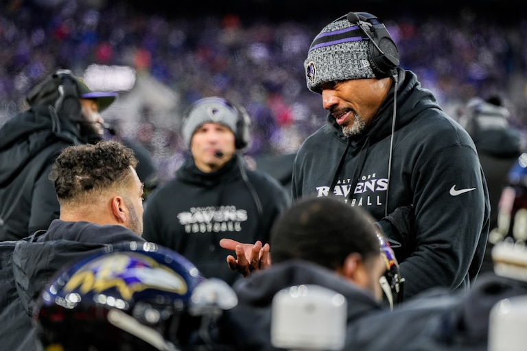 Baltimore Ravens Assistant Head Coach/Defensive Line Anthony Weaver talks with linebacker Kyle Van Noy (50) during the AFC divisional playoff game against the Houston Texans at M&T Bank Stadium on Saturday, Jan. 20, 2024.