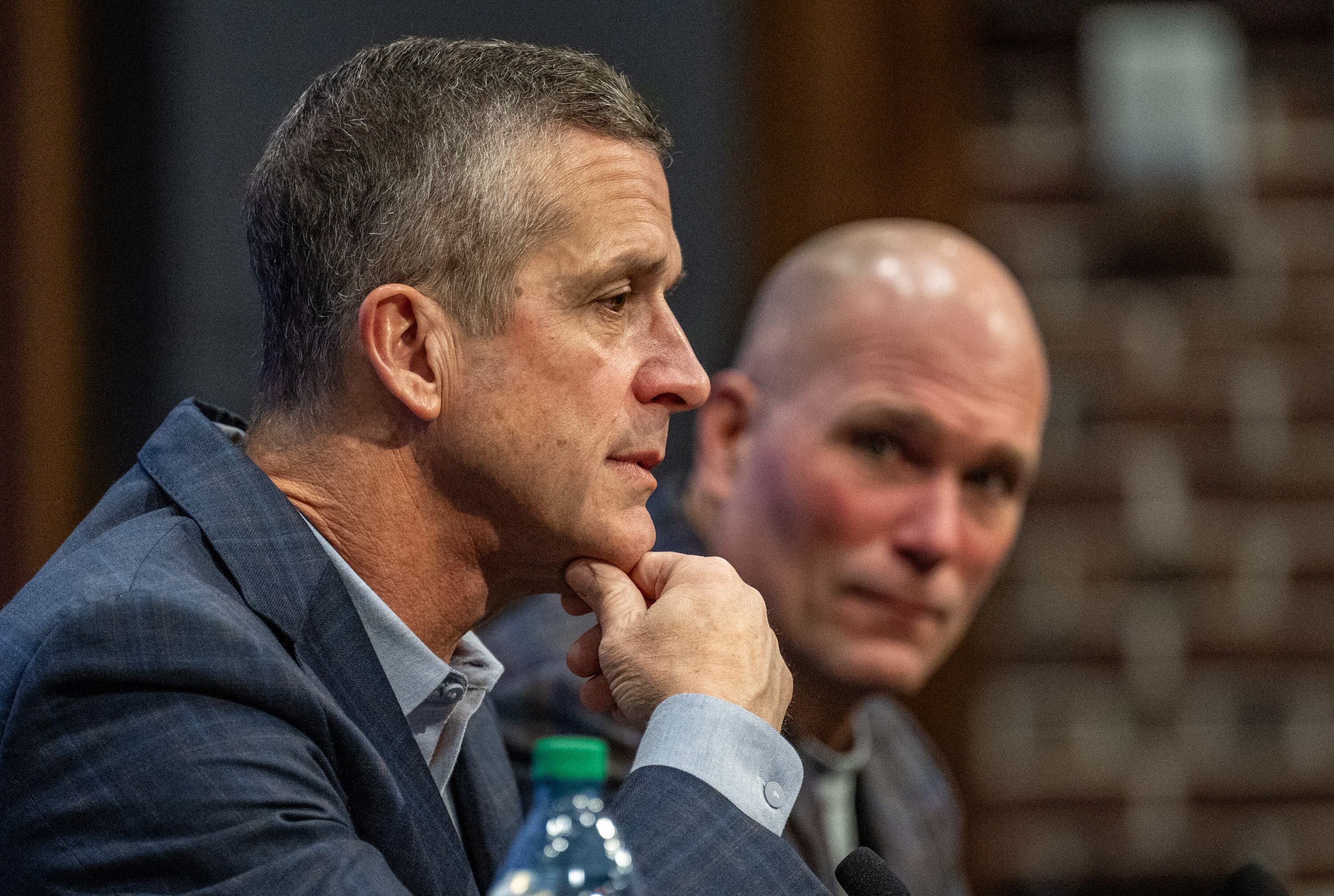 Ravens coach John Harbaugh, left, and general manager Eric DeCosta will take questions from reporters for the first time this week since 16 massage therapists made allegations of inappropriate behavior against kicker Justin Tucker.