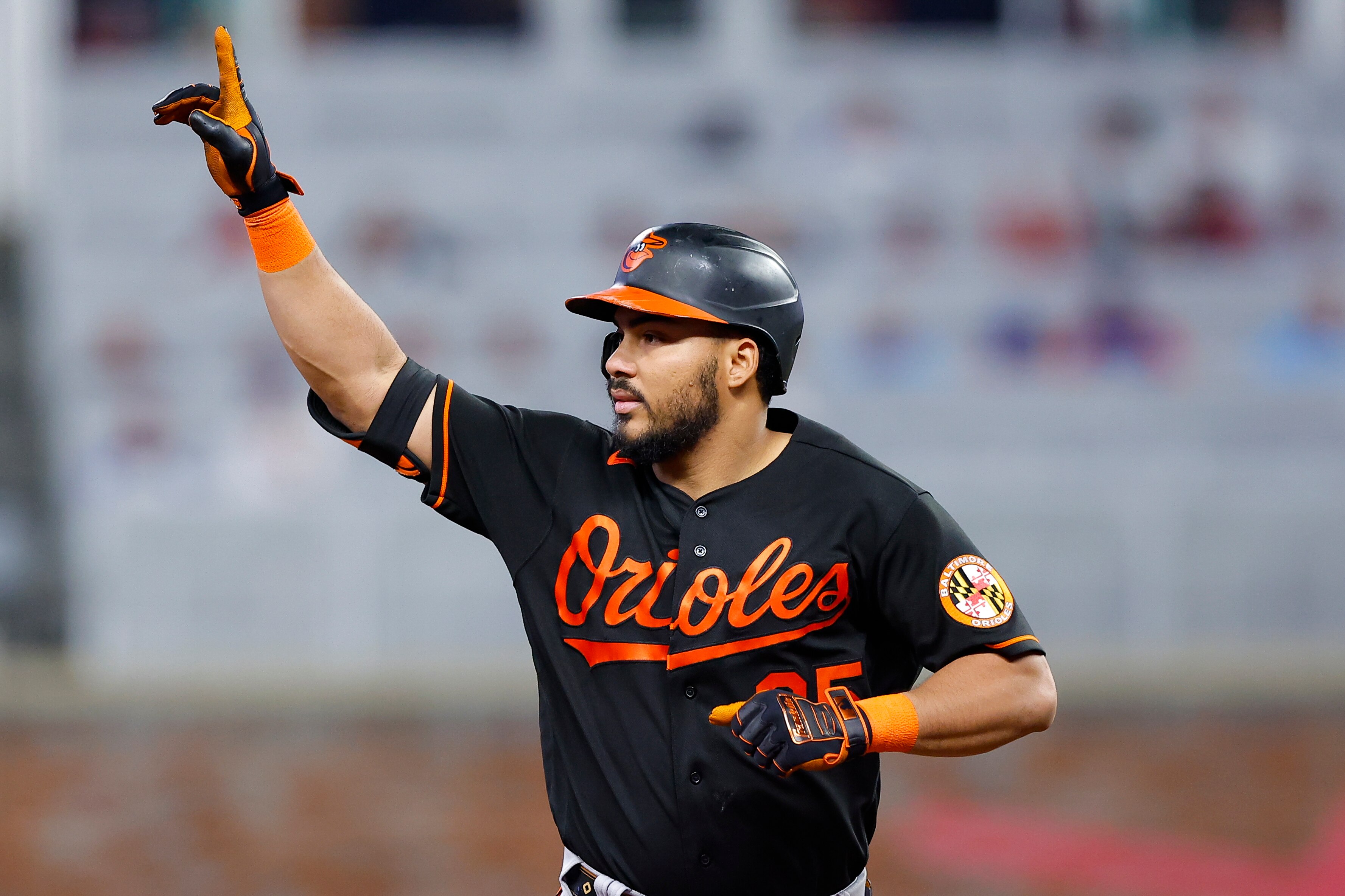 ATLANTA, GA - MAY 05: Anthony Santander #25 of the Baltimore Orioles reacts after hitting a grand slam during the seventh inning of the game against the Atlanta Braves at Truist Park on May 5, 2023 in Atlanta, Georgia.