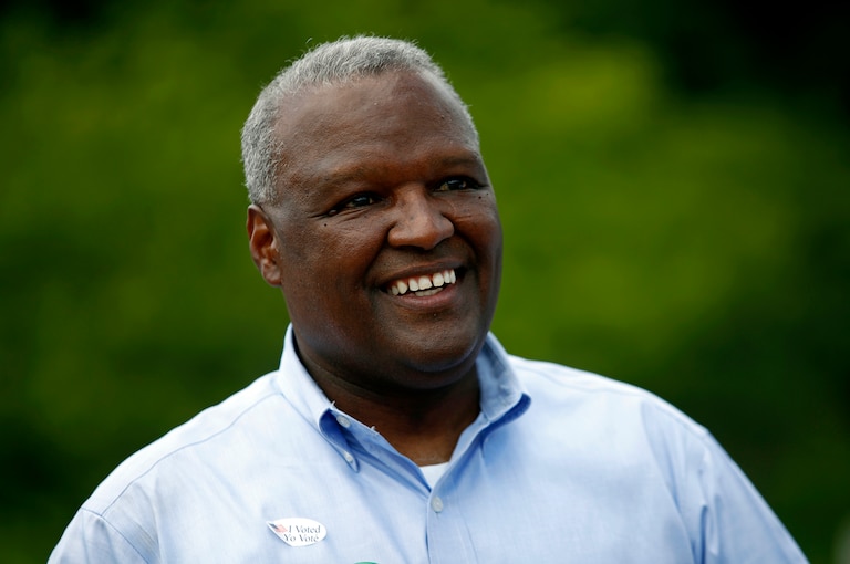 Maryland Democratic gubernatorial candidate Rushern Baker greets voters outside of a polling place, Tuesday, June 26, 2018, in Silver Spring, Md. Baker and former NAACP President Ben Jealous lead a crowded Democratic primary field to win a nomination to face popular Republican Gov. Larry Hogan in the fall.
