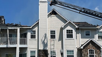 The Baltimore County Fire Department responds to a fire on Brixworth Court on Thursday.