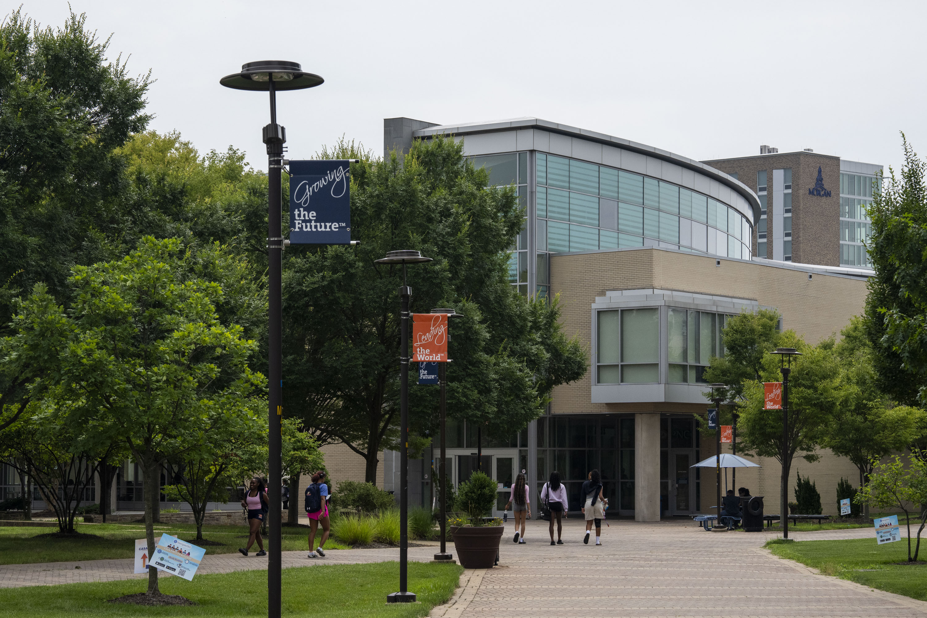Students walk around campus several weeks before classes begin at Morgan State University on August 5, 2025.