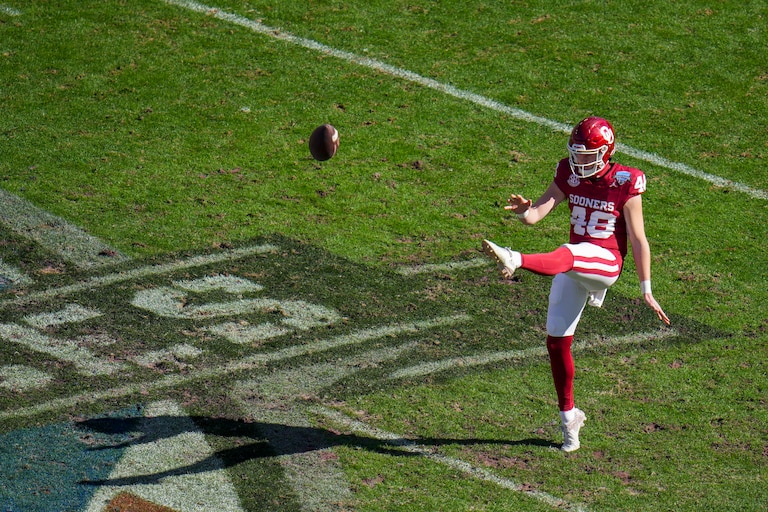 Oklahoma punter Luke Elzinga boots the ball during the second half of the Armed Forces Bowl against Navy on Dec. 27, 2024.