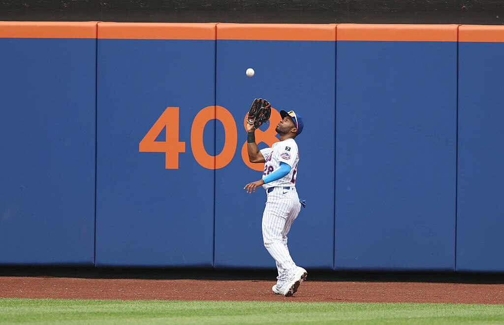 Cedric Mullins catches a fly ball against the Cleveland Guardians during the Mets' game at Citi Field on August 6.