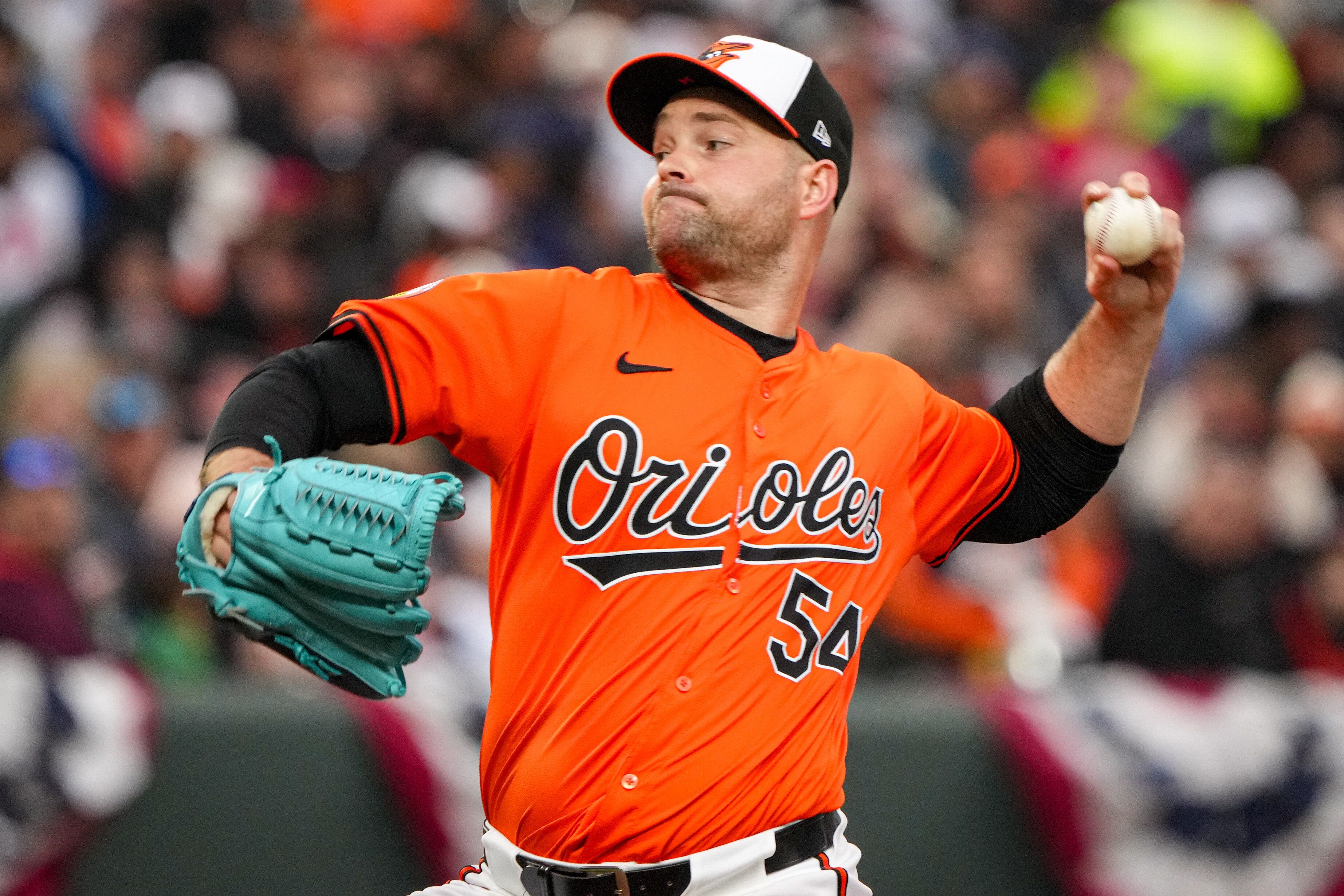 Baltimore Orioles relief pitcher Danny Coulombe (54) delivers a pitch in a game against the Los Angeles Angels at Camden Yards on March 30, 2024. The Baltimore Orioles beat the Angels, 13-4, to clinch a series win.