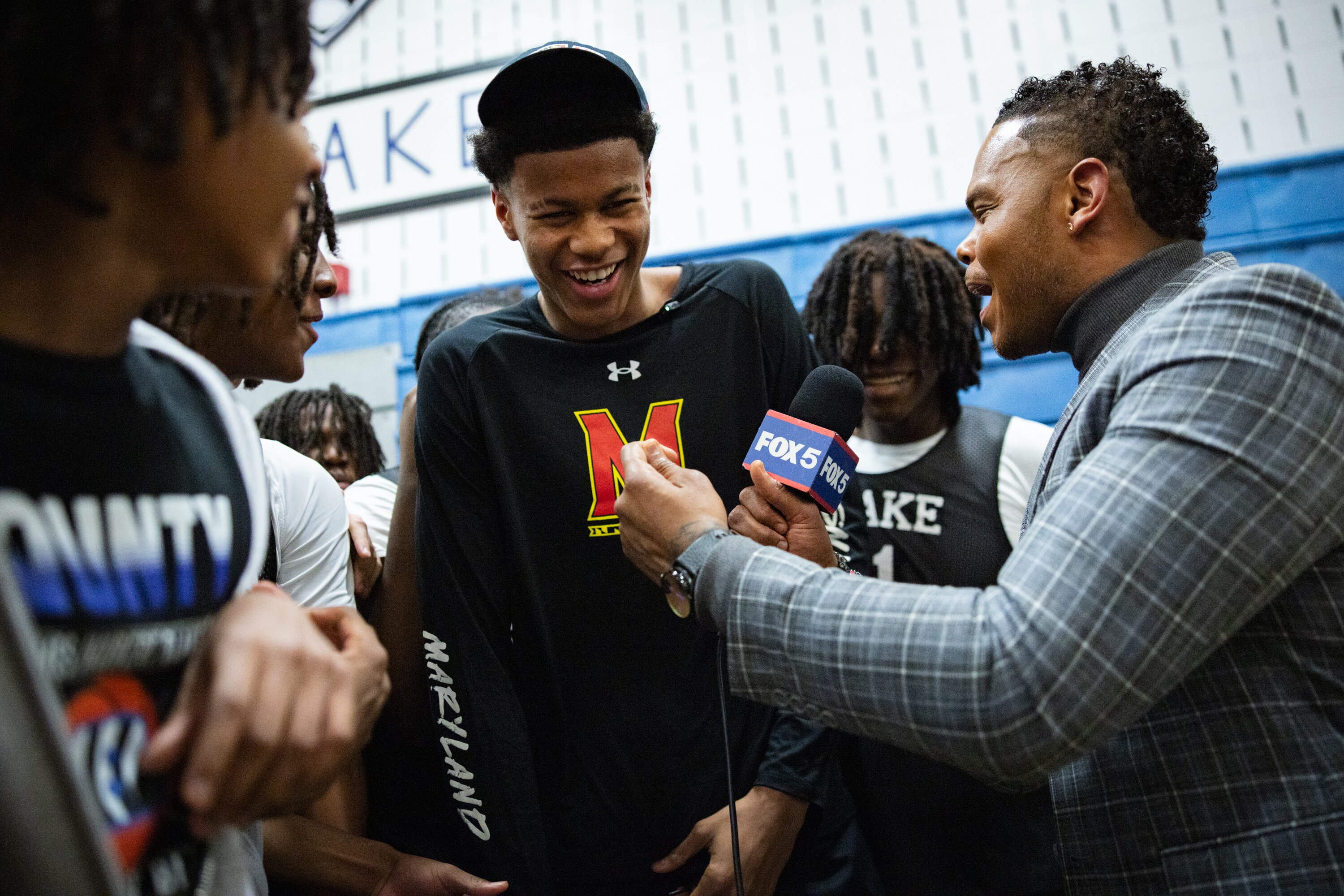Blake basketball star Baba Oladotun commits to University of Maryland’s Terps from Blake High School in Cloverly, MD on November 19, 2025. After the announcement, he is embraced be peers, coaches, friends, and family.