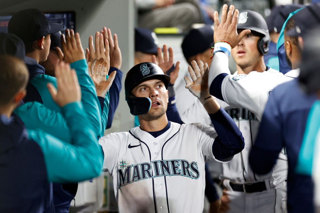 SEATTLE, WASHINGTON - OCTOBER 04: Adam Frazier #26 of the Seattle Mariners celebrates scoring a run in the fifth inning at T-Mobile Park on October 04, 2022 in Seattle, Washington. (Photo by Steph Chambers/Getty Images)