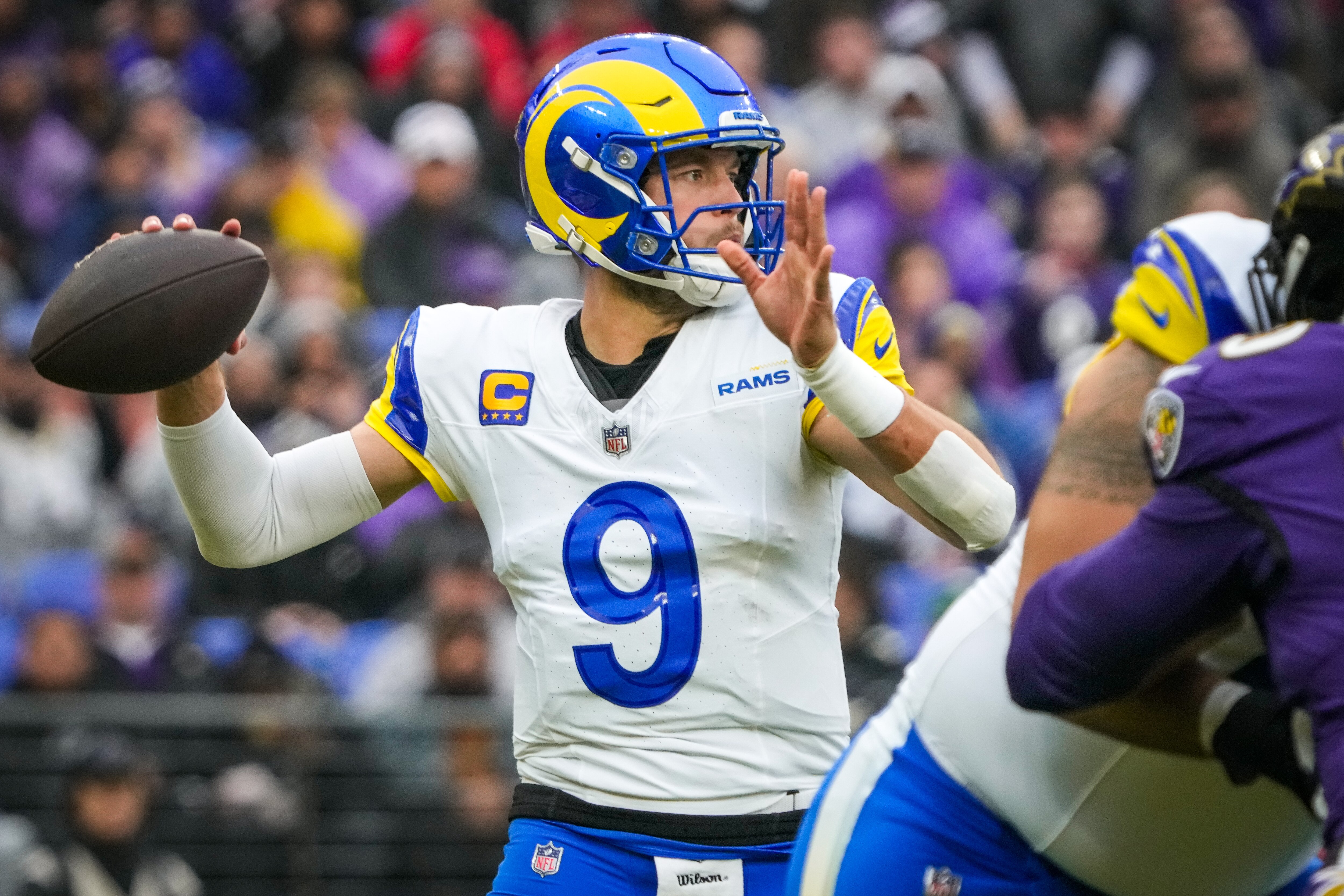Los Angeles Rams quarterback Matthew Stafford (9) throws the ball during the first quarter against the Baltimore Ravens at M&T Bank Stadium on Sunday, Dec. 10, 2023.