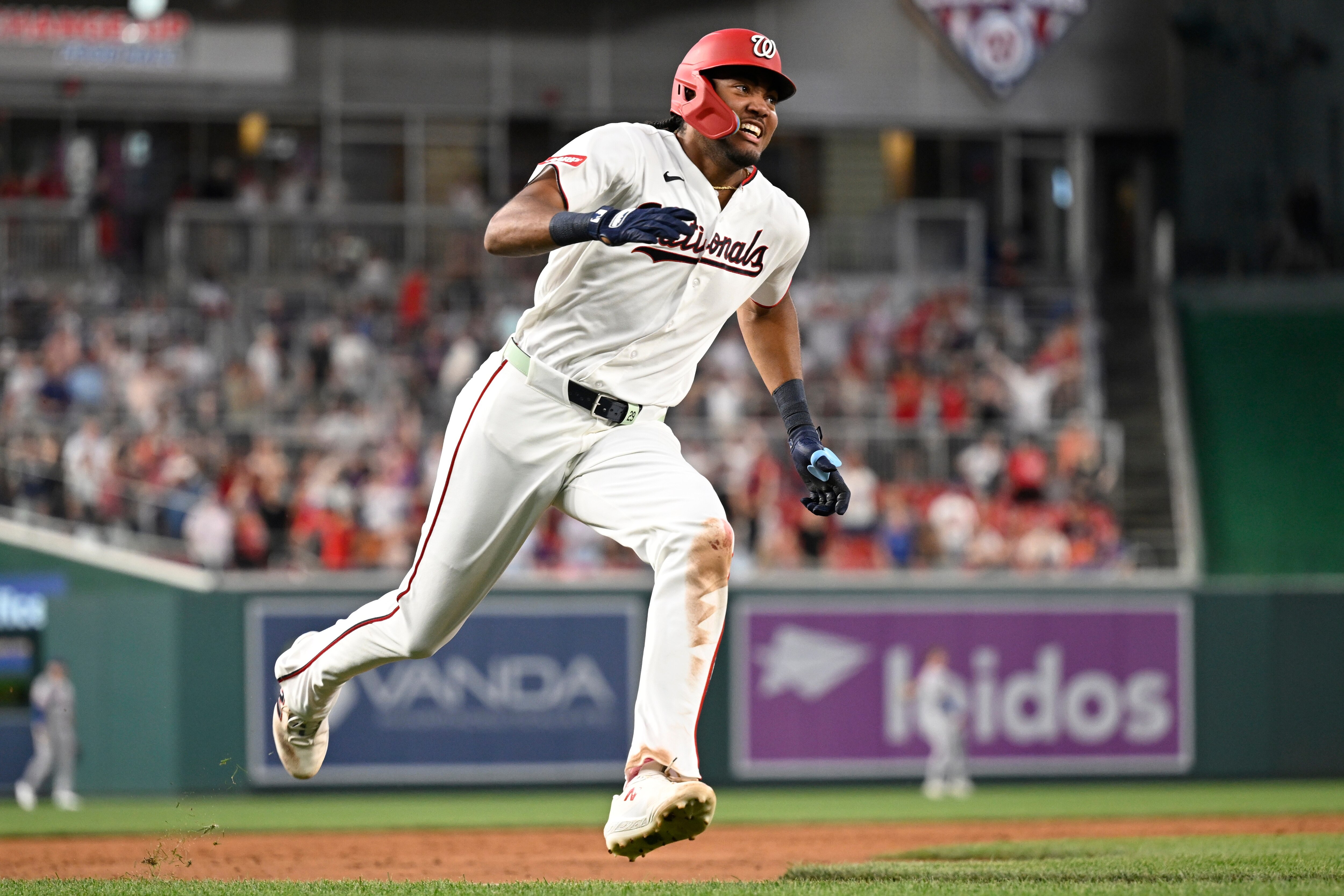 Washington Nationals' James Wood races around the bases on an inside-the-park grand slam during a baseball game against the New York Mets, Tuesday, May 19, 2026, in Washington.