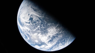 A view of Earth taken by NASA astronaut and Artemis II Commander Reid Wiseman from one of the Orion spacecraft's four windows after completing the translunar injection burn on April 2, 2026.