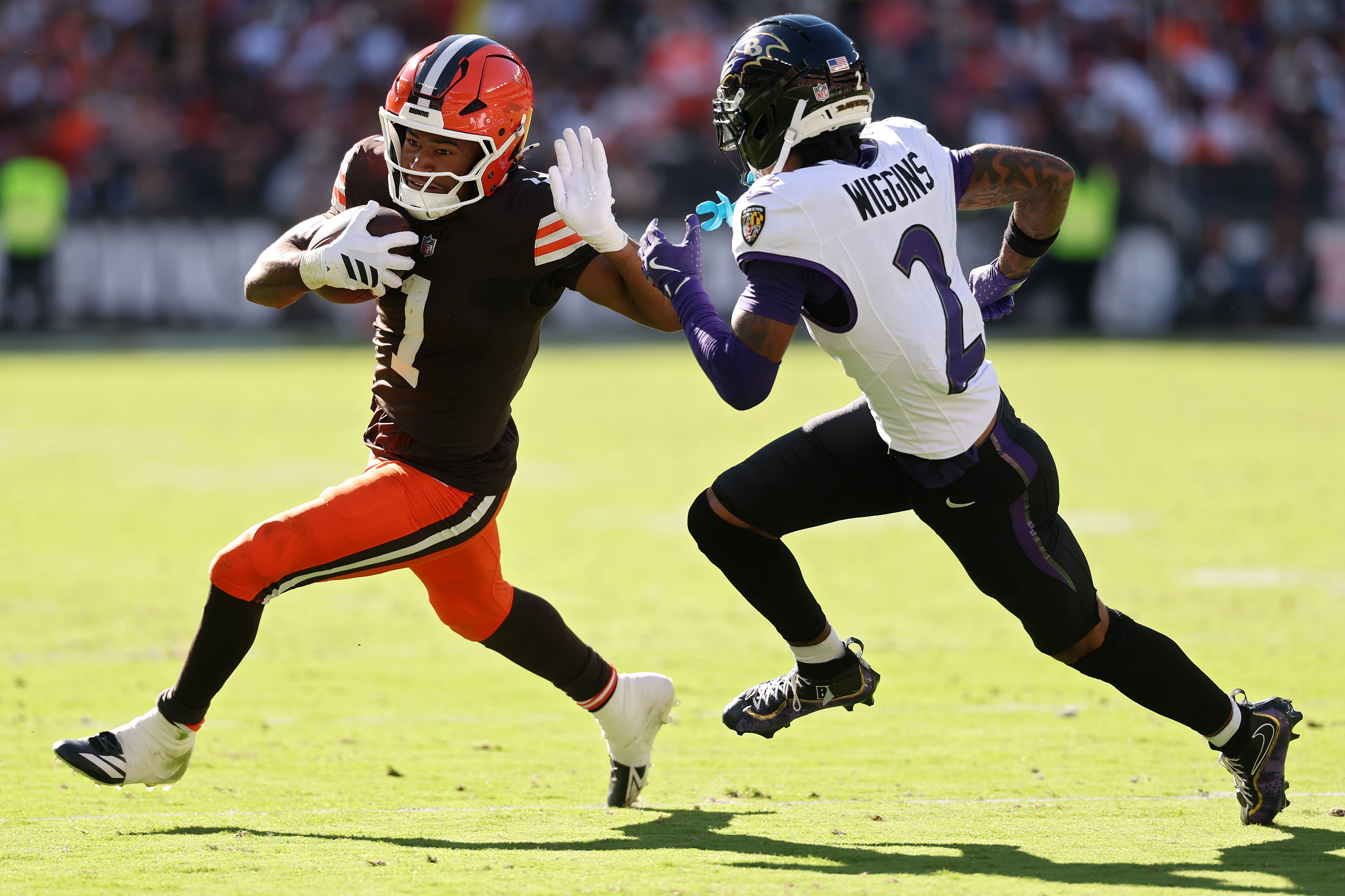 CLEVELAND, OHIO - OCTOBER 18: Kc Concepcion #1 of the Cleveland Browns runs with the ball against Nate Wiggins #2 of the Baltimore Ravens during the fourth quarter of the game at Huntington Bank Field on October 18, 2026 in Cleveland, Ohio. (Photo by Gregory Shamus/Getty Images)