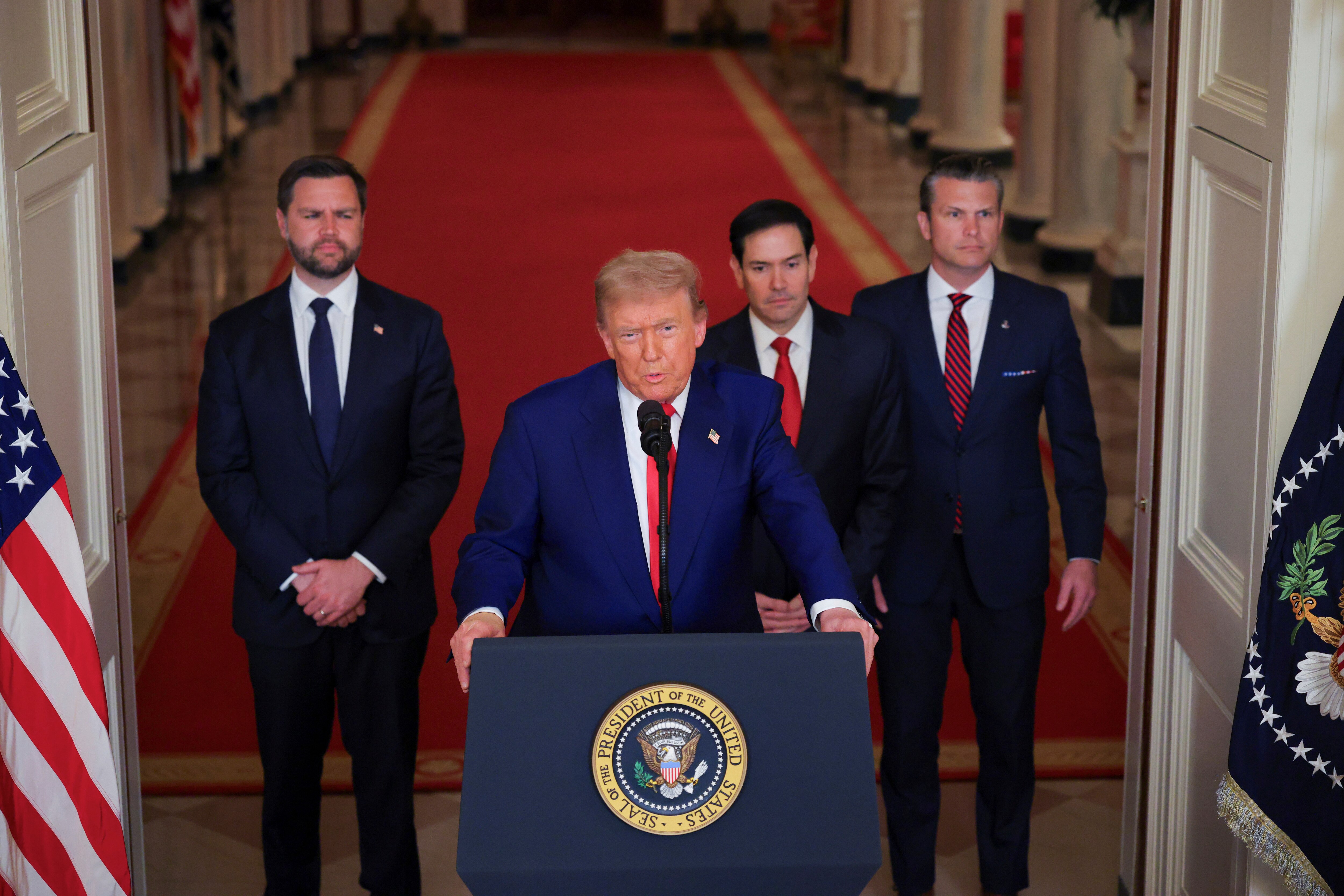 President Donald Trump speaks from the East Room of the White House in Washington, D.C., on Saturday, June 21, 2025, after the U.S. military struck three Iranian nuclear and military sites, directly joining Israel's effort to decapitate the country's nuclear program, as Vice President JD Vance, Secretary of State Marco Rubio and Defense Secretary Pete Hegseth listen.