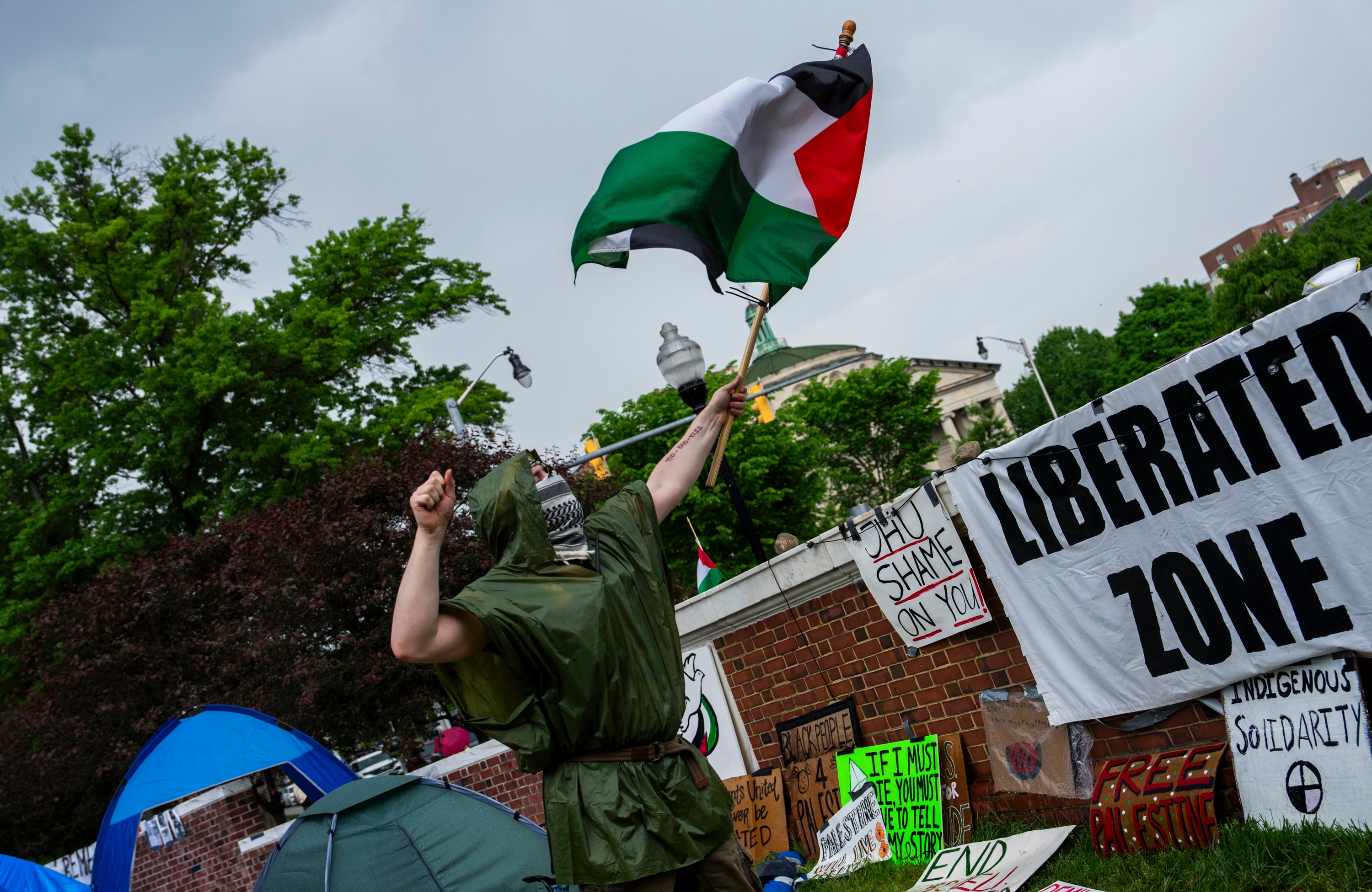 As pro-Palestine demonstrations at Johns Hopkins University stretch into their second week, protesters are demanding the school cut ties with the Department of Defense, which awards billions to a Hopkins research lab.