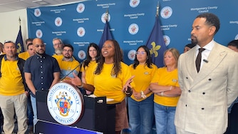 FRIDAY, APRIL 17, 2026 - Lisa Blackwell-Brown, secretary-treasurer of UFCW Local 1994 MCGEO, speaks at a press conference Friday as County Council member Will Jawando, right, looks on.